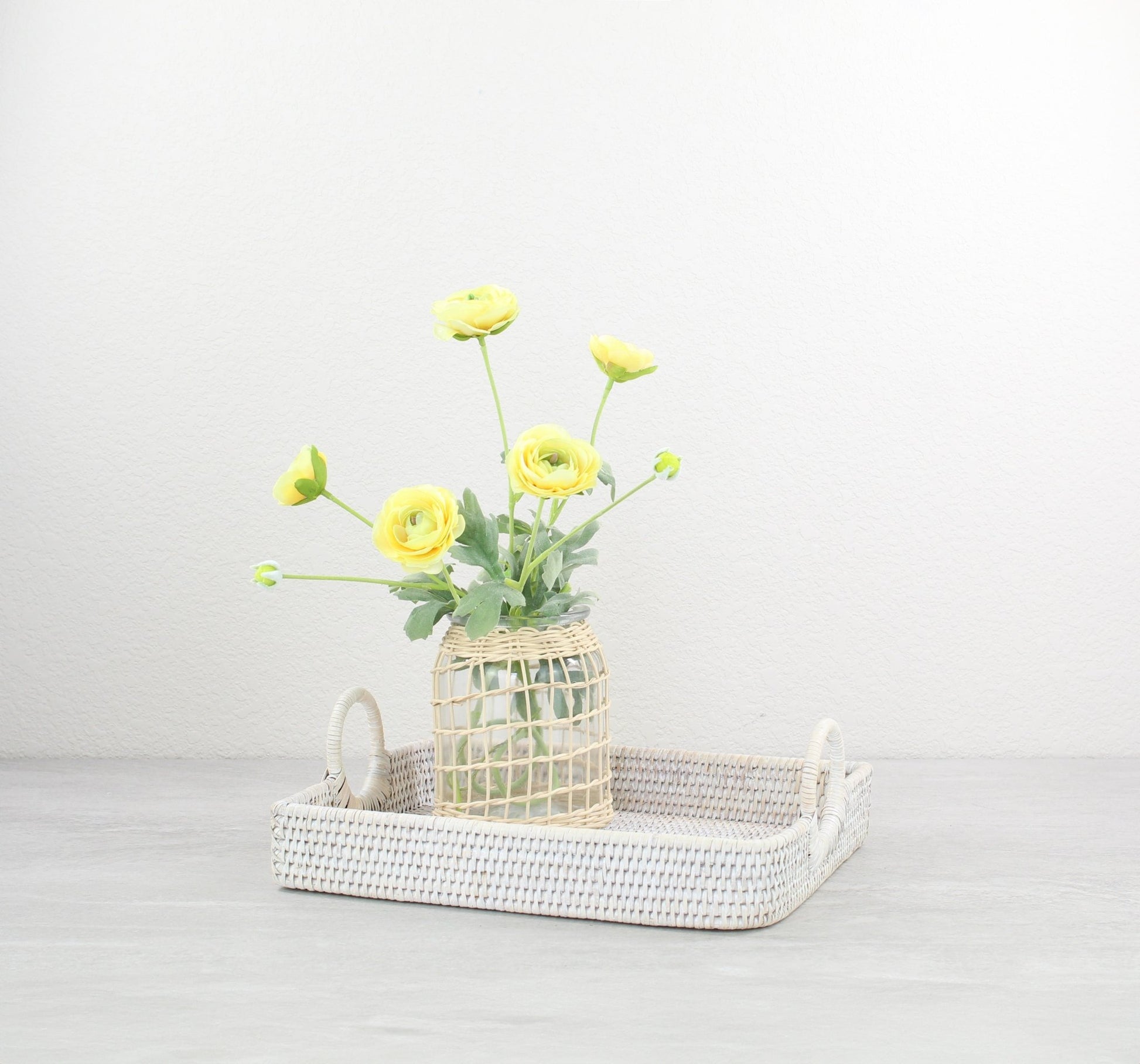 Eco Handcraft classic whitewash leaf shaped rattan tray with yellow floral vase and looped handles