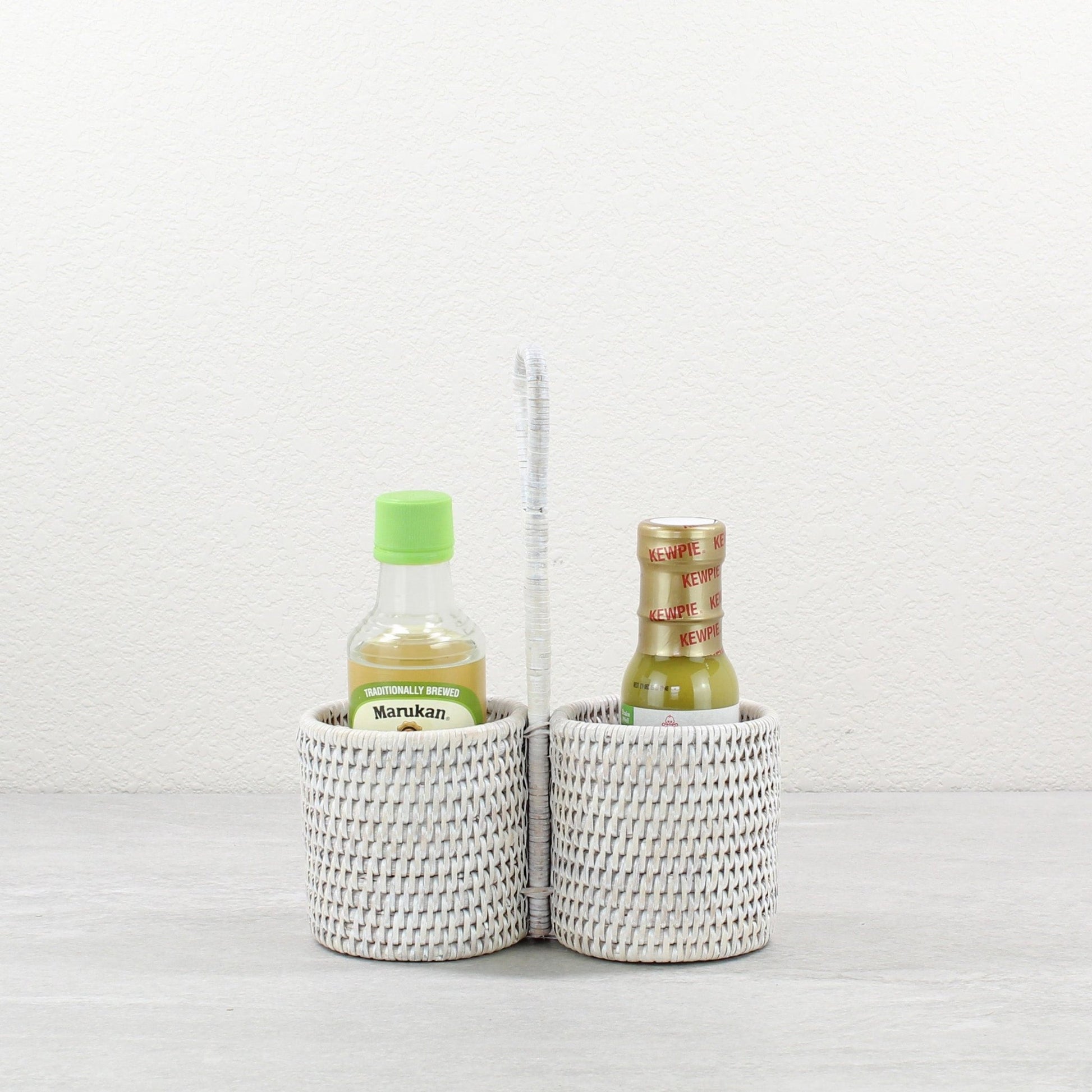 ECO HANDCRAFT whitewashed rattan dual-case condiment holder with handle, ideal for sauces, oils, or picnic serving