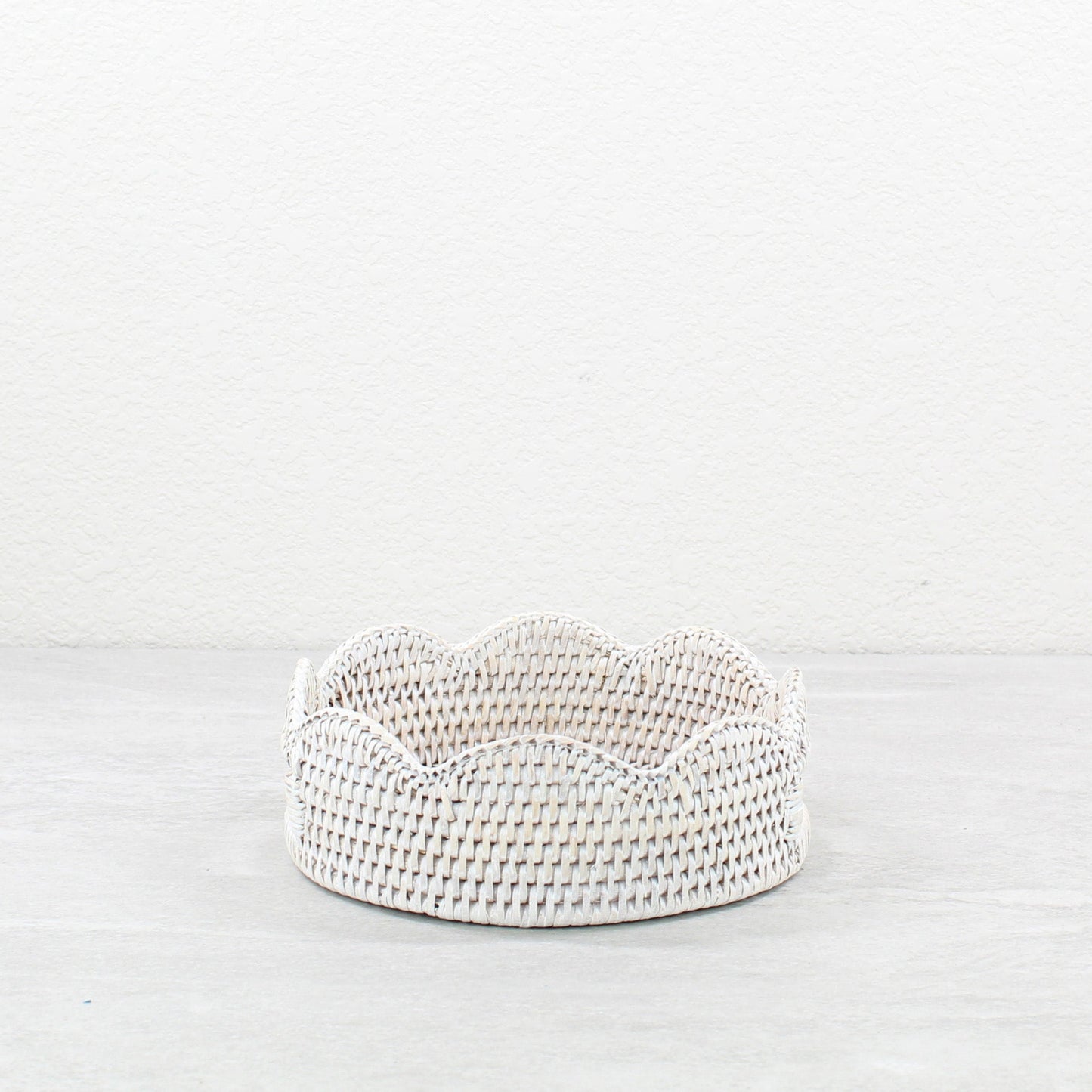 Eco Handcraft scalloped round rattan tray with handles for bright, calming vanity display