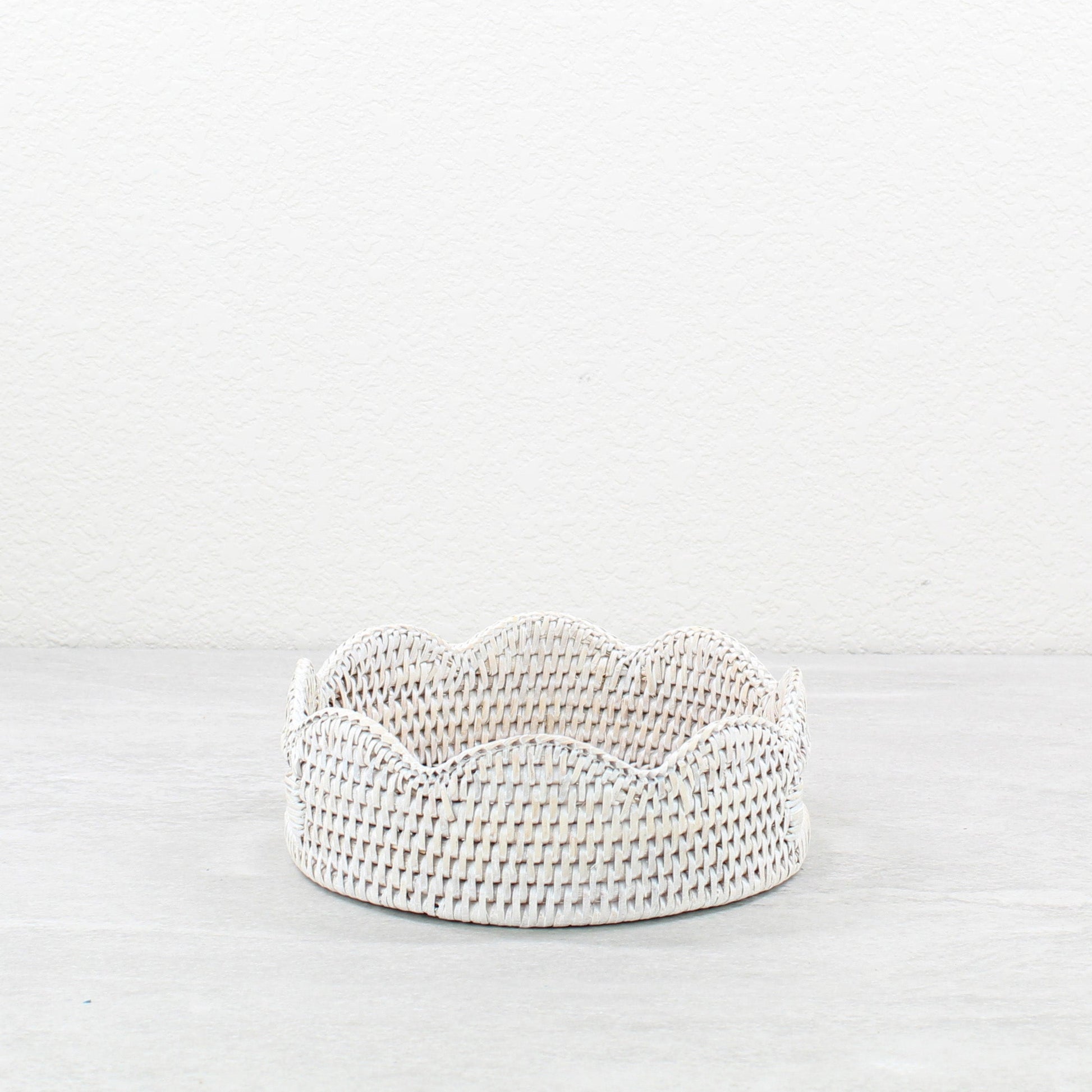 Eco Handcraft scalloped round rattan tray with handles for bright, calming vanity display