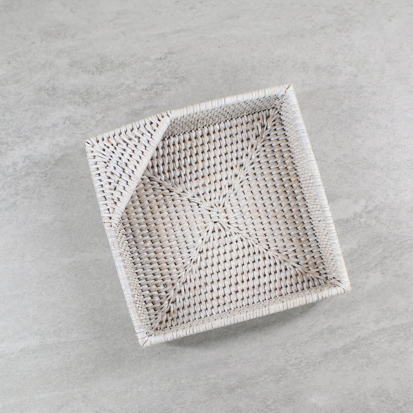 ECO HANDCRAFT whitewashed square rattan tray with corner fold detail, perfect for organizing or serving with style