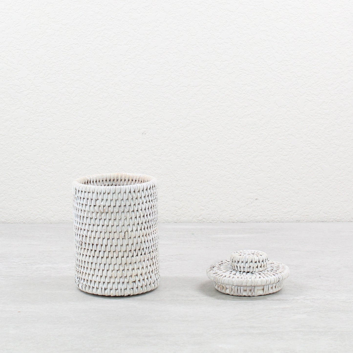 Eco Handcraft whitewash rattan canister with lid, ideal for bathroom, vanity, or small item storage