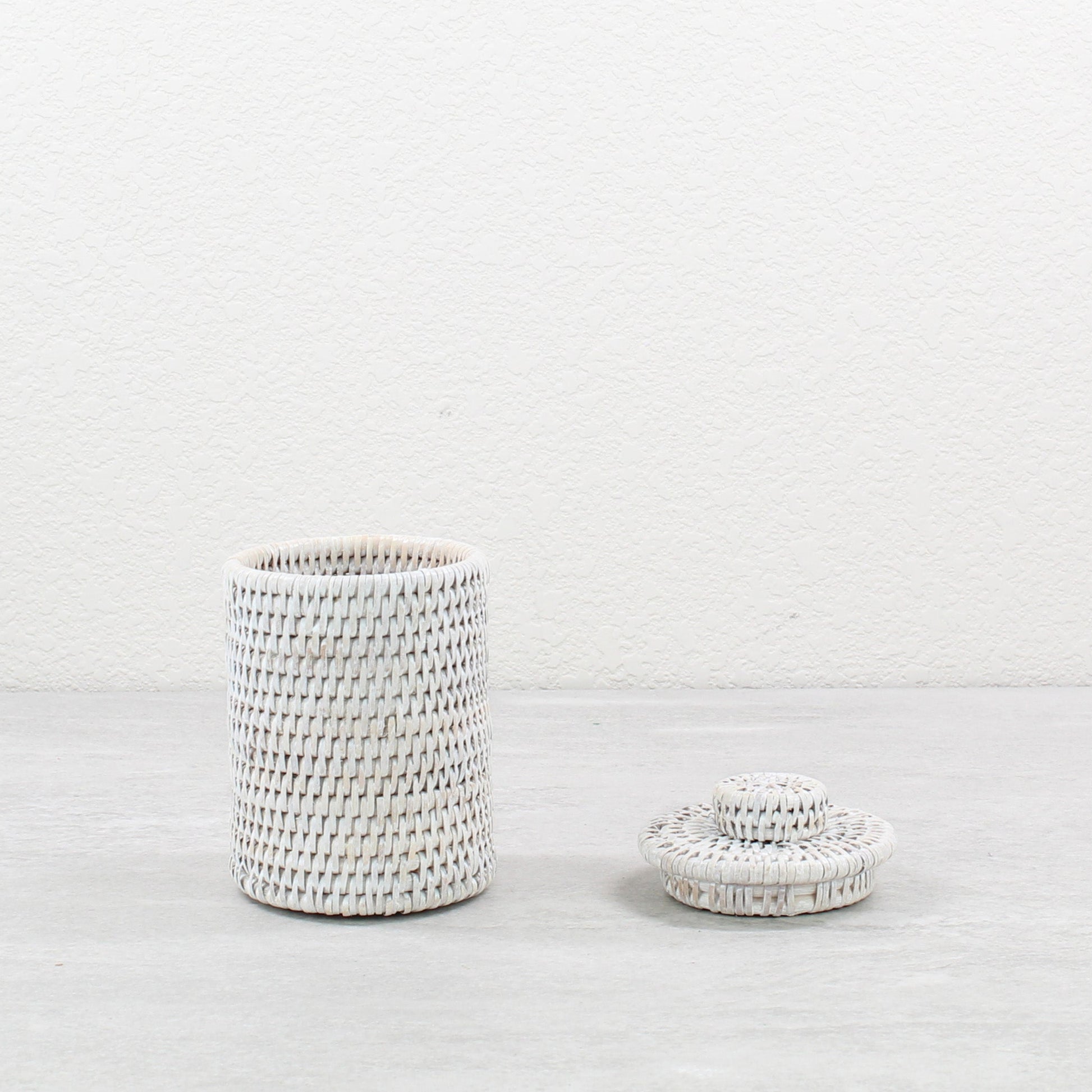 Eco Handcraft whitewash rattan canister with lid, ideal for bathroom, vanity, or small item storage