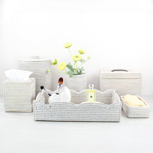 Eco Handcraft whitewash rattan bathroom set with tissue box, canister, scalloped tray, and organizer, styled with yellow flowers