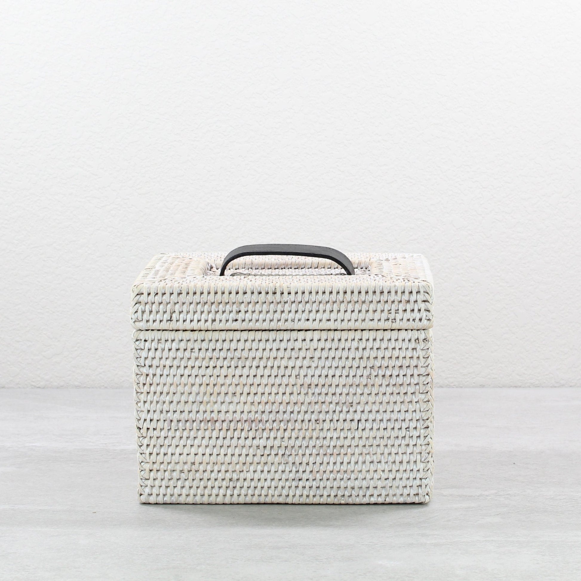 Eco Handcraft whitewash rattan storage box with black handle, elegant handmade organizer for home or bathroom use