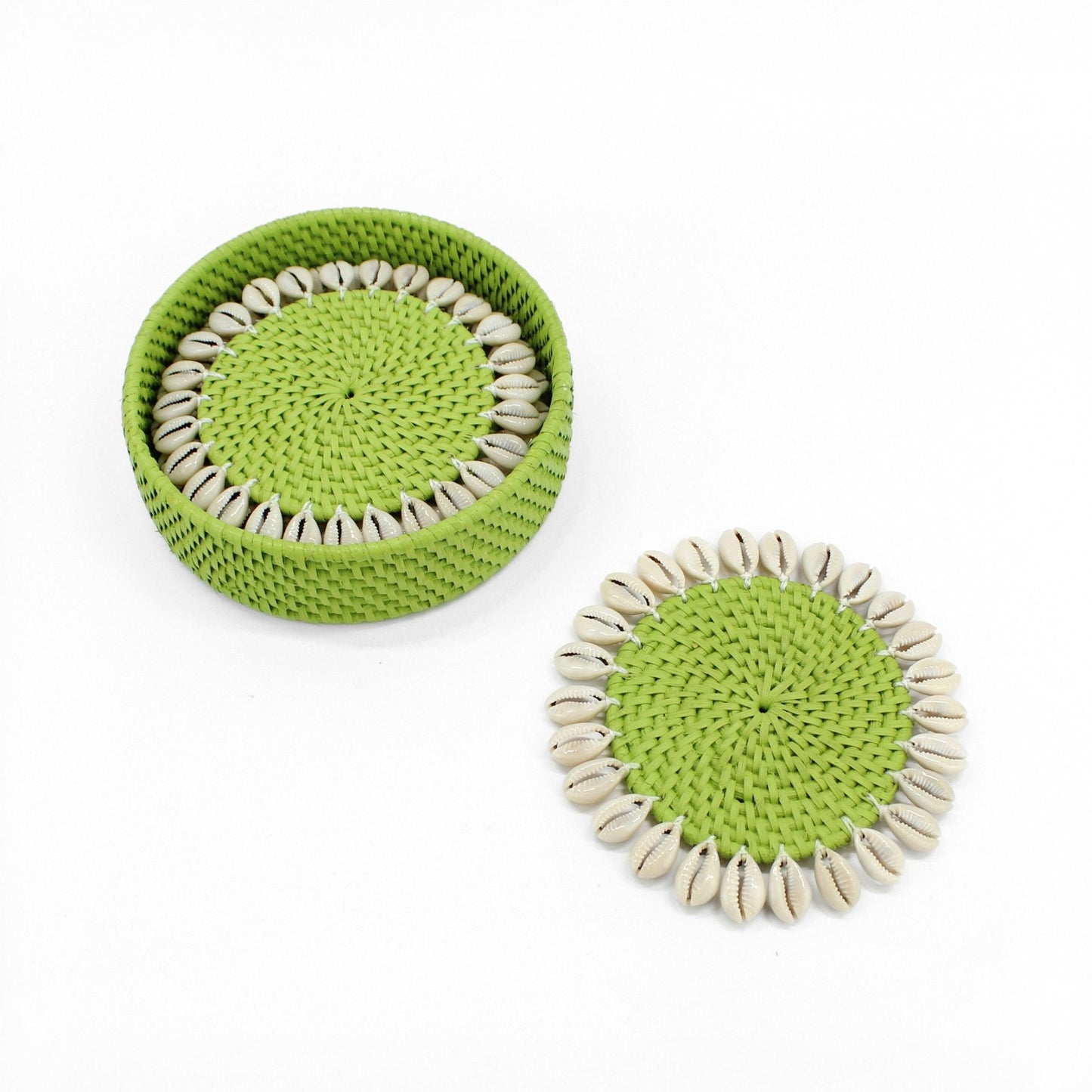 Round green rattan coasters trimmed with real seashells shown with matching storage case, perfect for tropical table settings