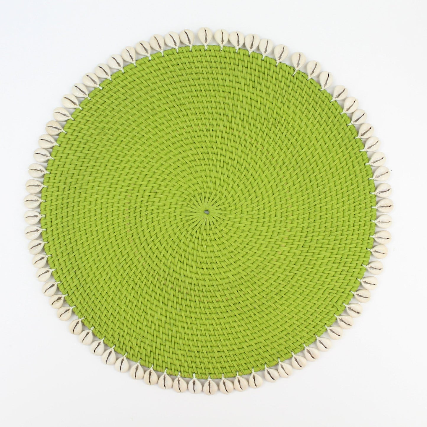 Handmade lime green rattan placemat with natural seashell trim, shown on white background for clean, product-only display