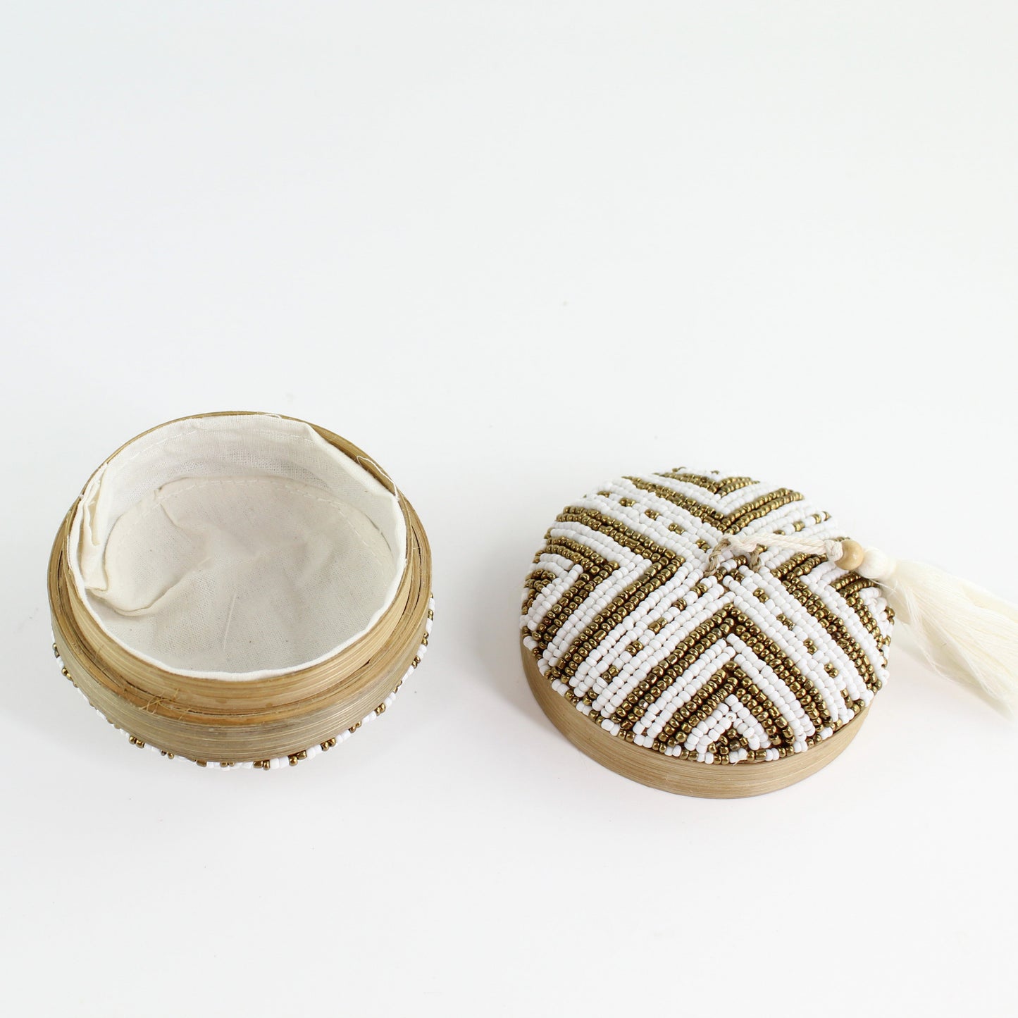 Open handmade bamboo beaded box with white fabric lining and removable lid, ideal for jewelry or keepsake storage.