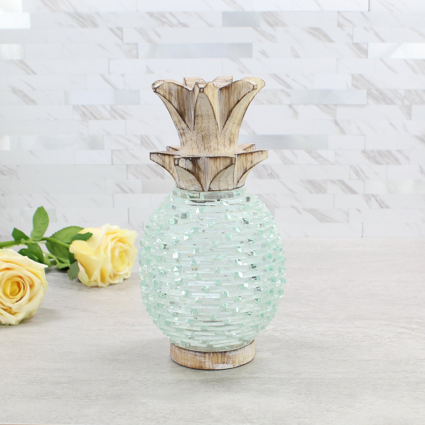Medium-sized handcrafted pineapple candle holder made of textured glass and wood, showcasing artisan craftsmanship and elegant tropical design.