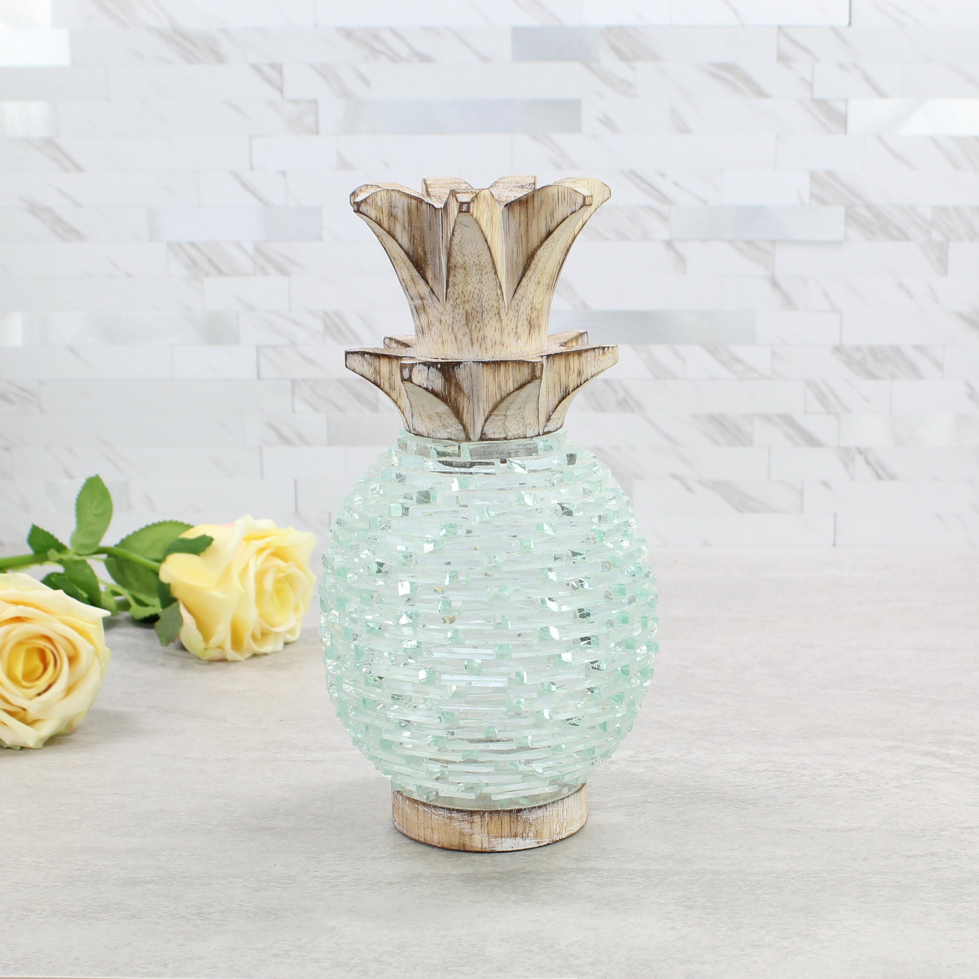 Medium-sized handcrafted pineapple candle holder made of textured glass and wood, showcasing artisan craftsmanship and elegant tropical design.