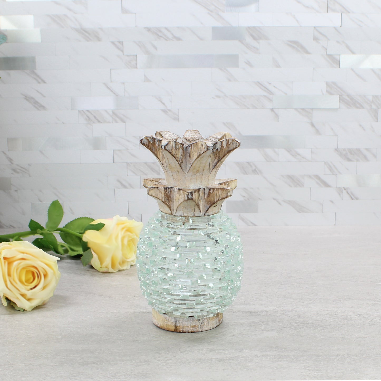 Small handmade pineapple glass tea light holder with rustic whitewashed wood top and base, ideal for cozy table or shelf decor.