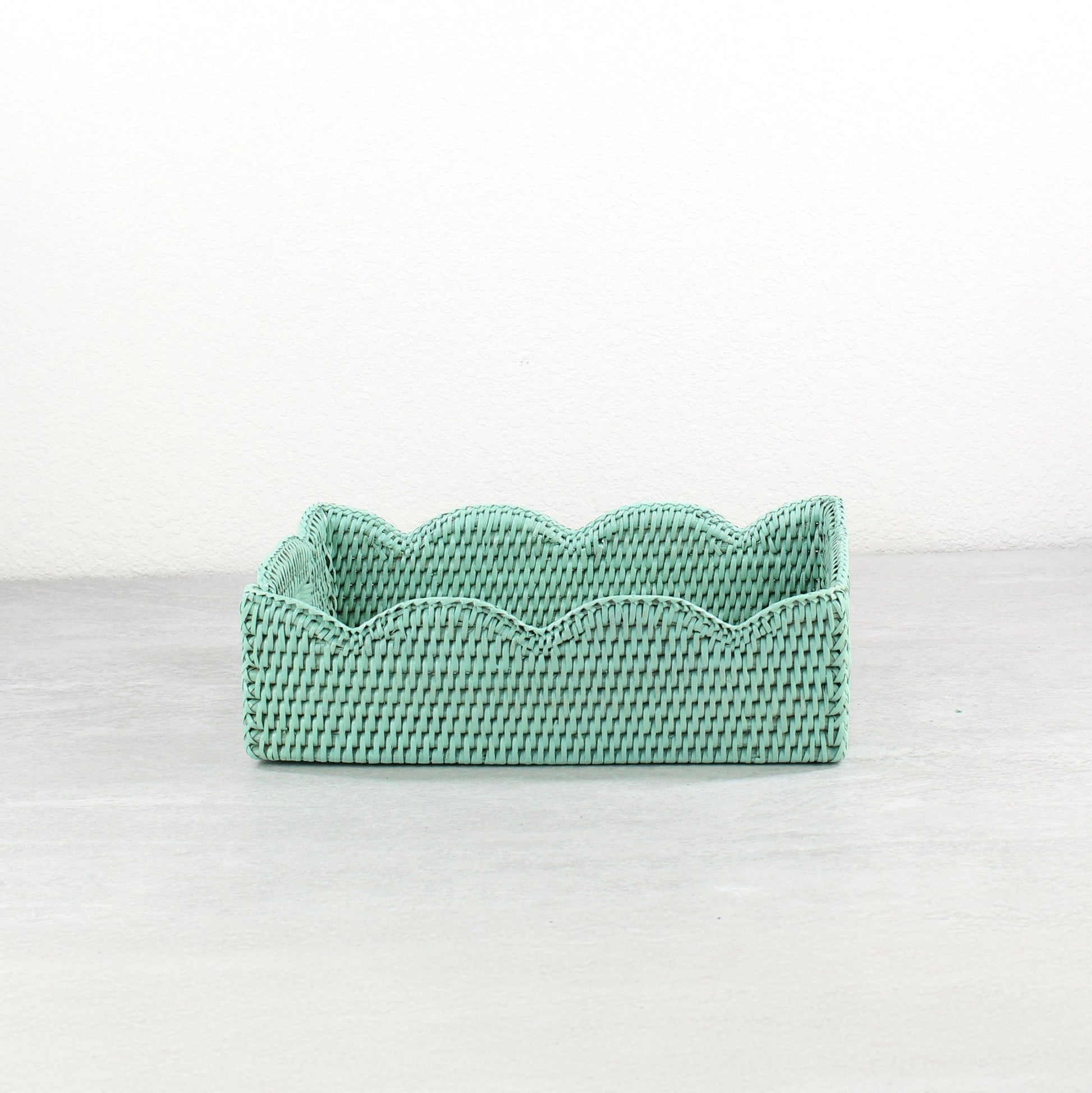 Sage Leaf Green scalloped rattan tray with woven texture and handles, shown in side view on a neutral background.