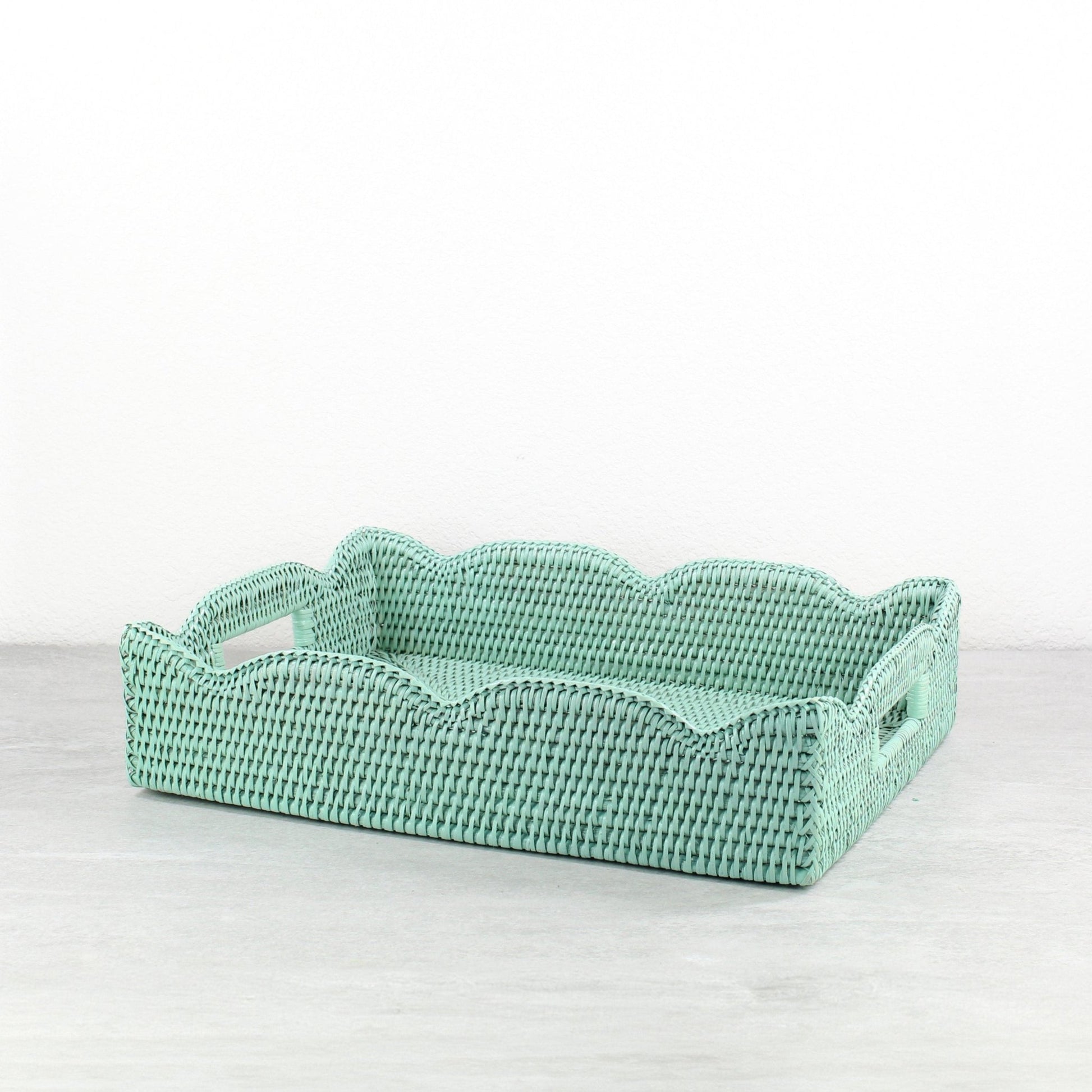 Sage Leaf Green scalloped rectangle rattan tray with handles, tightly woven and handmade, displayed against a neutral background.