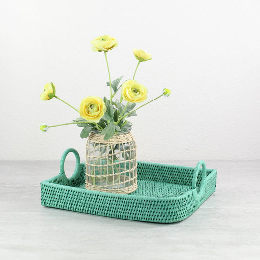 Eco Handcraft turquoise rattan tray with handles styled with glass flower vase, perfect for serving or spring table décor