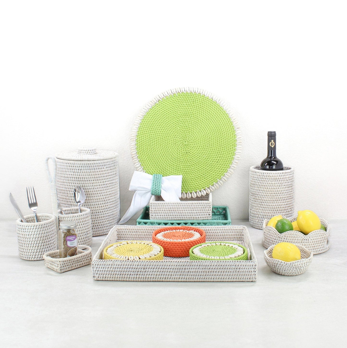 Eco Handcraft rattan kitchen and dining set in neutral and green tones with coasters, trays, wine holder, and utensil cups