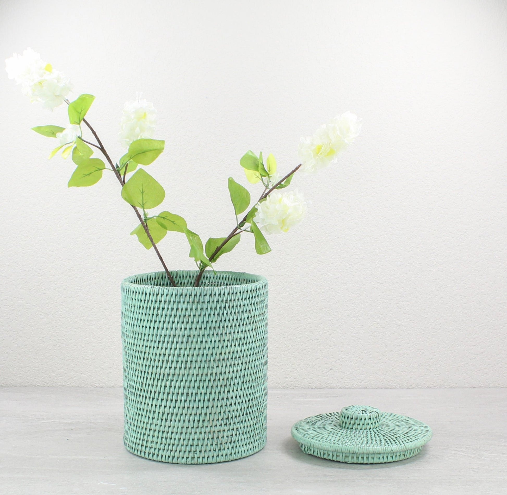 Eco Handcraft large sage green rattan canister with lid, perfect for being used as a vase