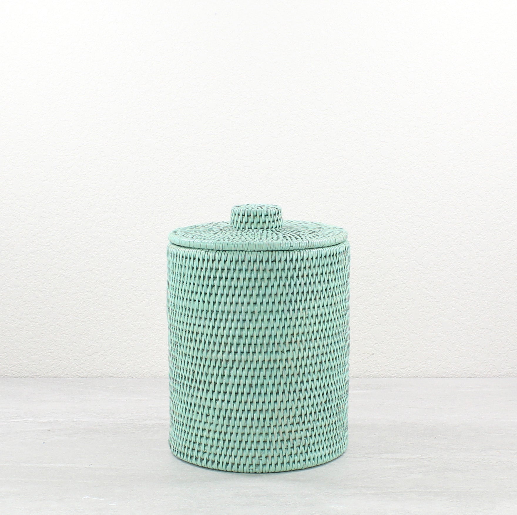 Eco Handcraft sage green handmade rattan canister with lid, perfect for bathroom or kitchen use, or as waste bin