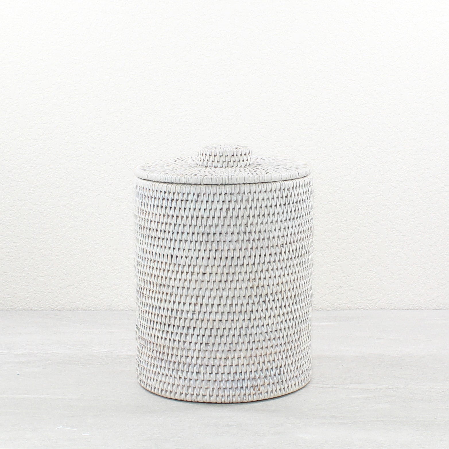 ECO HANDCRAFT tall whitewash rattan canister with lid for elegant and natural storage in spa or vanity areas