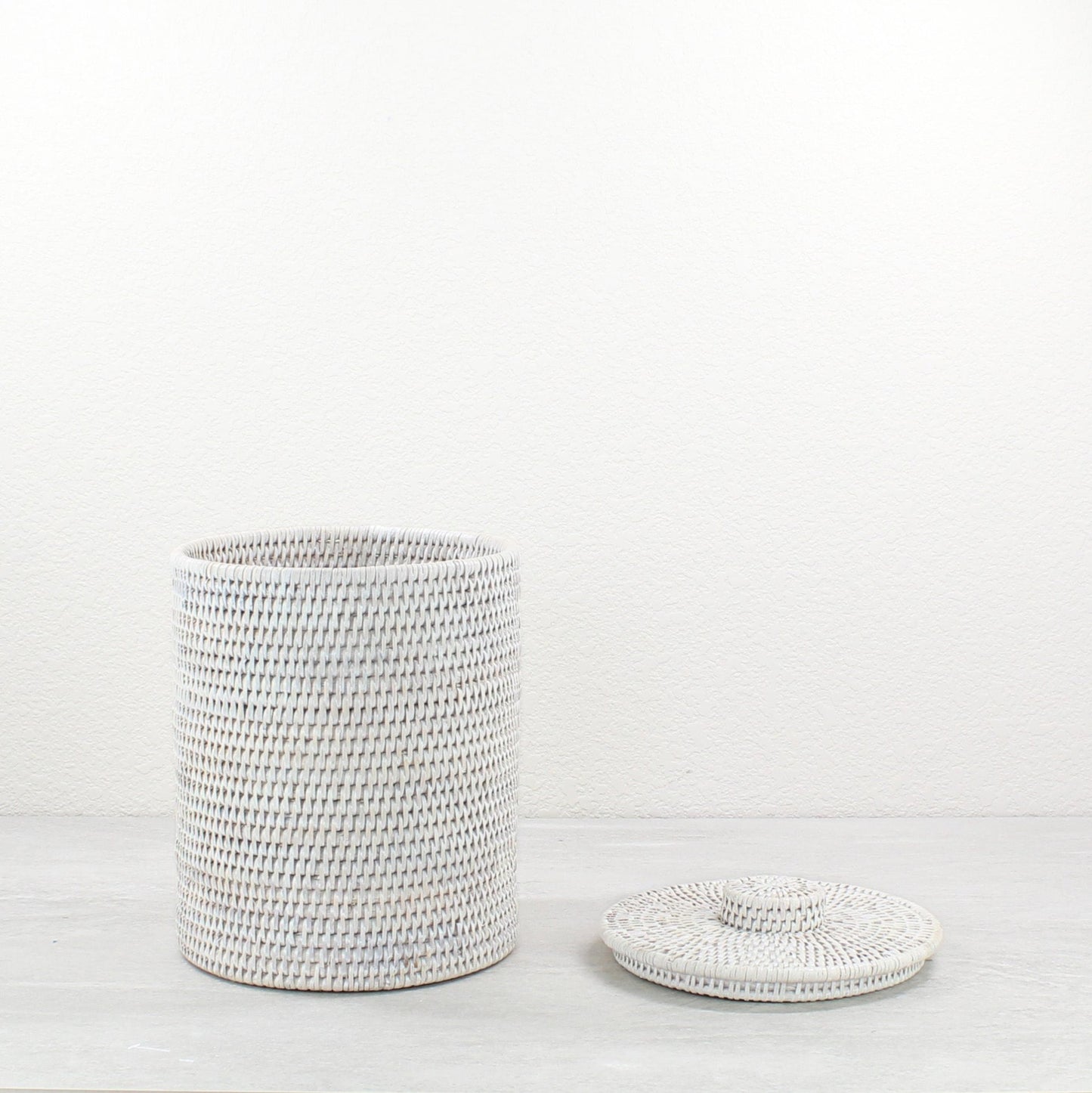 ECO HANDCRAFT tall whitewash rattan canister with lid, eco-friendly storage for towels, brushes, or dry goods