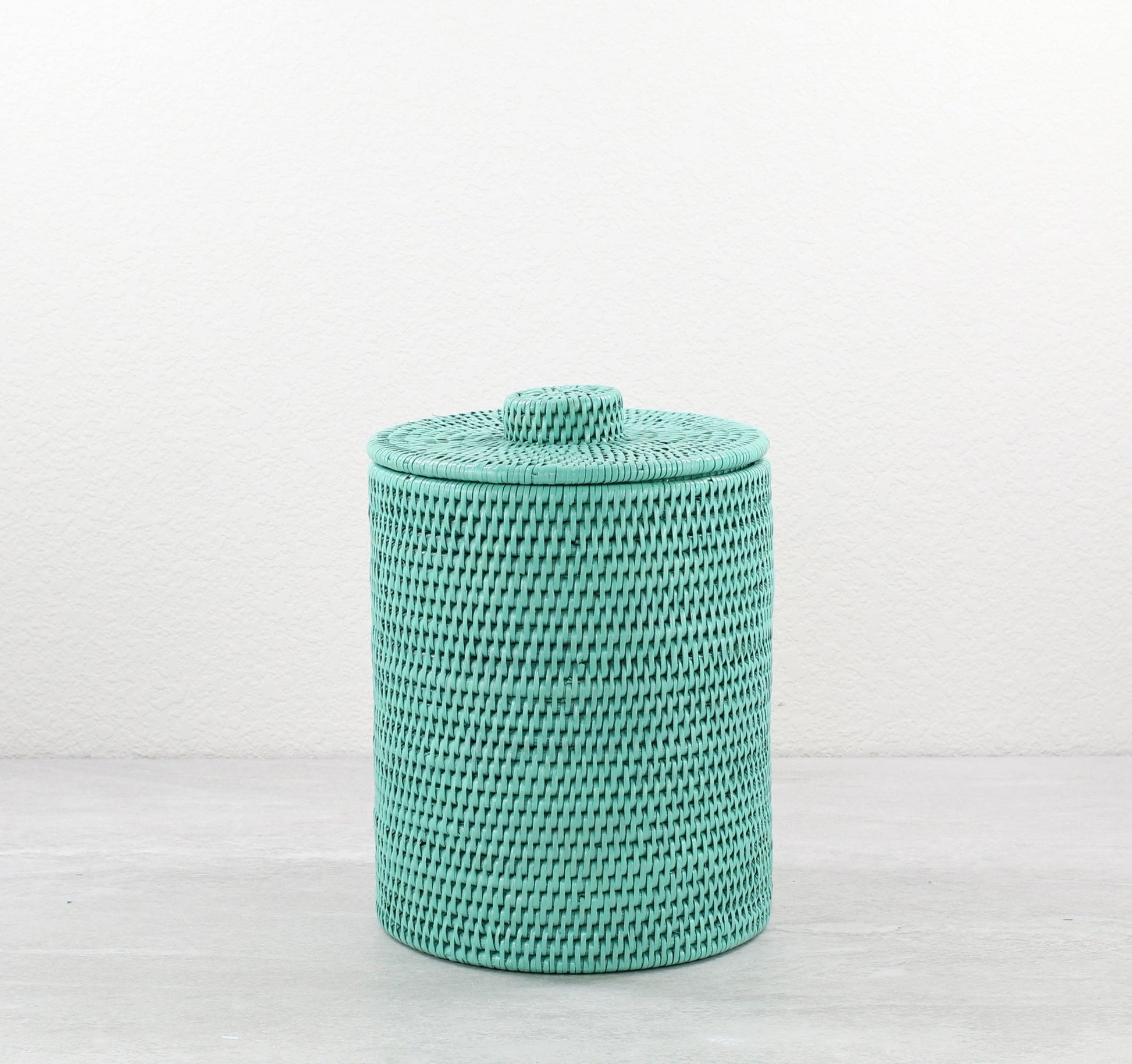 Eco Handcraft turquoise rattan canister with lid, perfect for storing cotton pads, spices, or bathroom essentials