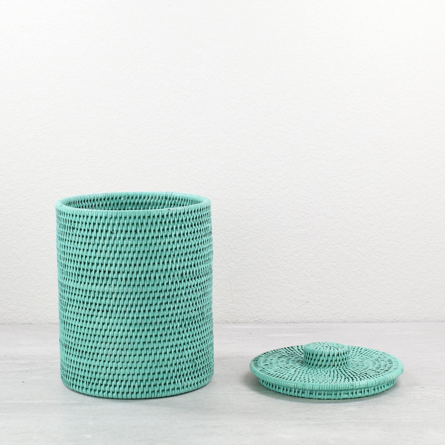 Eco Handcraft tall turquoise rattan canister with lid for stylish bathroom storage, spa display, or shelf organization