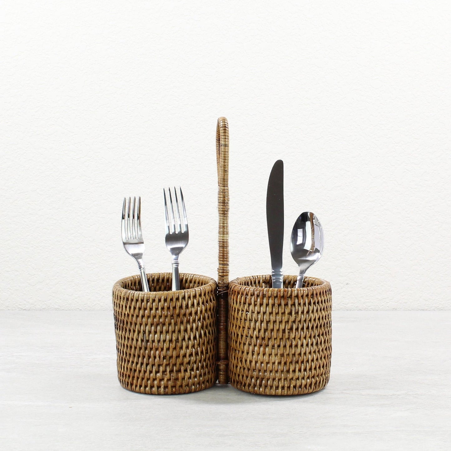 Eco Handcraft rattan dual-compartment condiment holder with handle, handcrafted from natural Burmese rattan for rustic dining style.