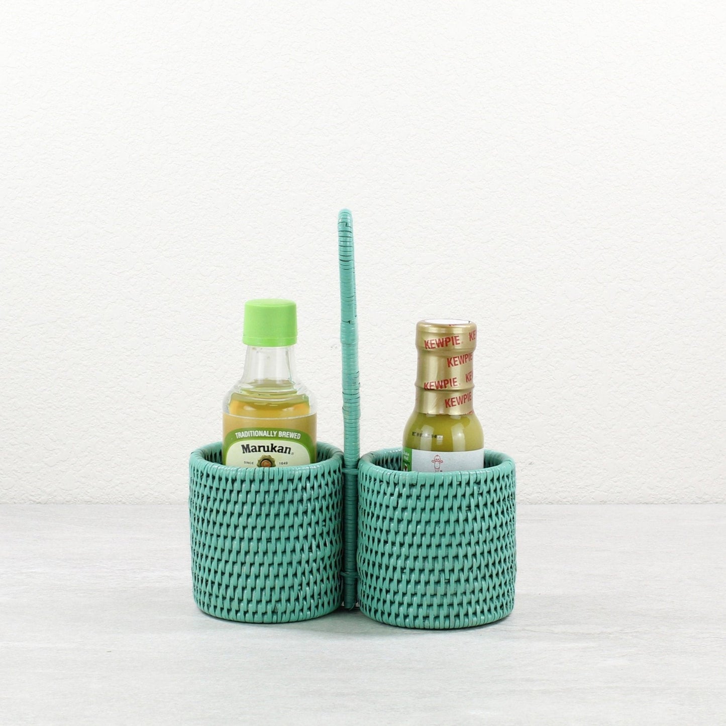 ECO HANDCRAFT turquoise rattan double condiment holder with handle, ideal for sauces, oil, or spices.