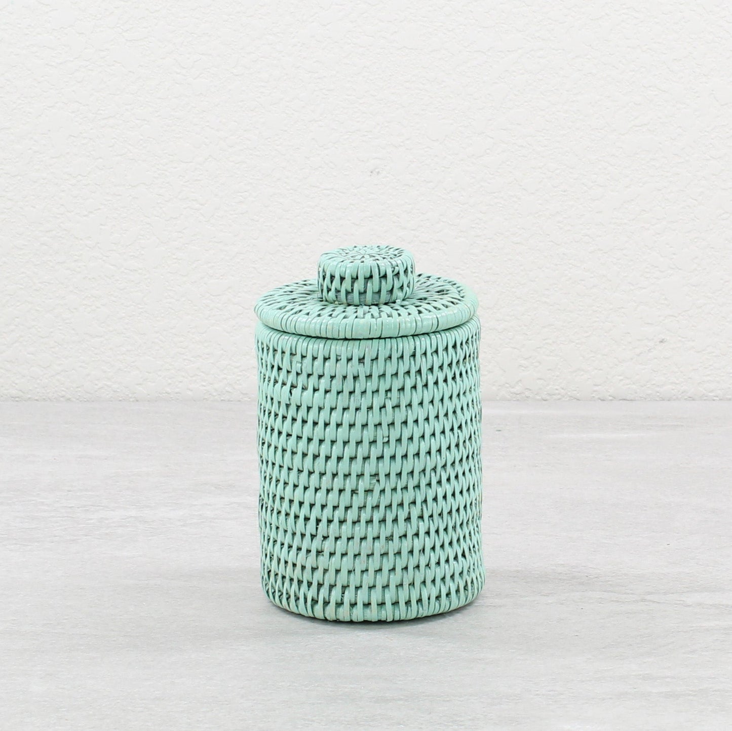 Eco Handcraft small sage green rattan canister with lid – handmade, sustainable storage for spa, vanity, or bath