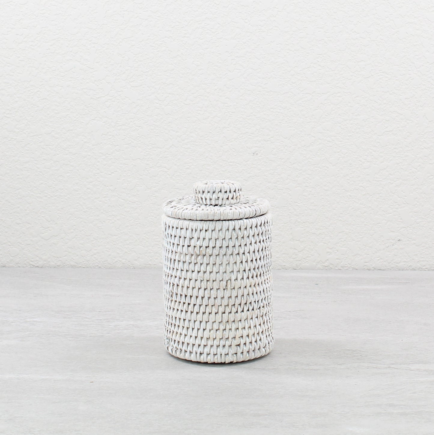 ECO HANDCRAFT medium whitewash rattan canister with lid, ideal for storing bath essentials or pantry items