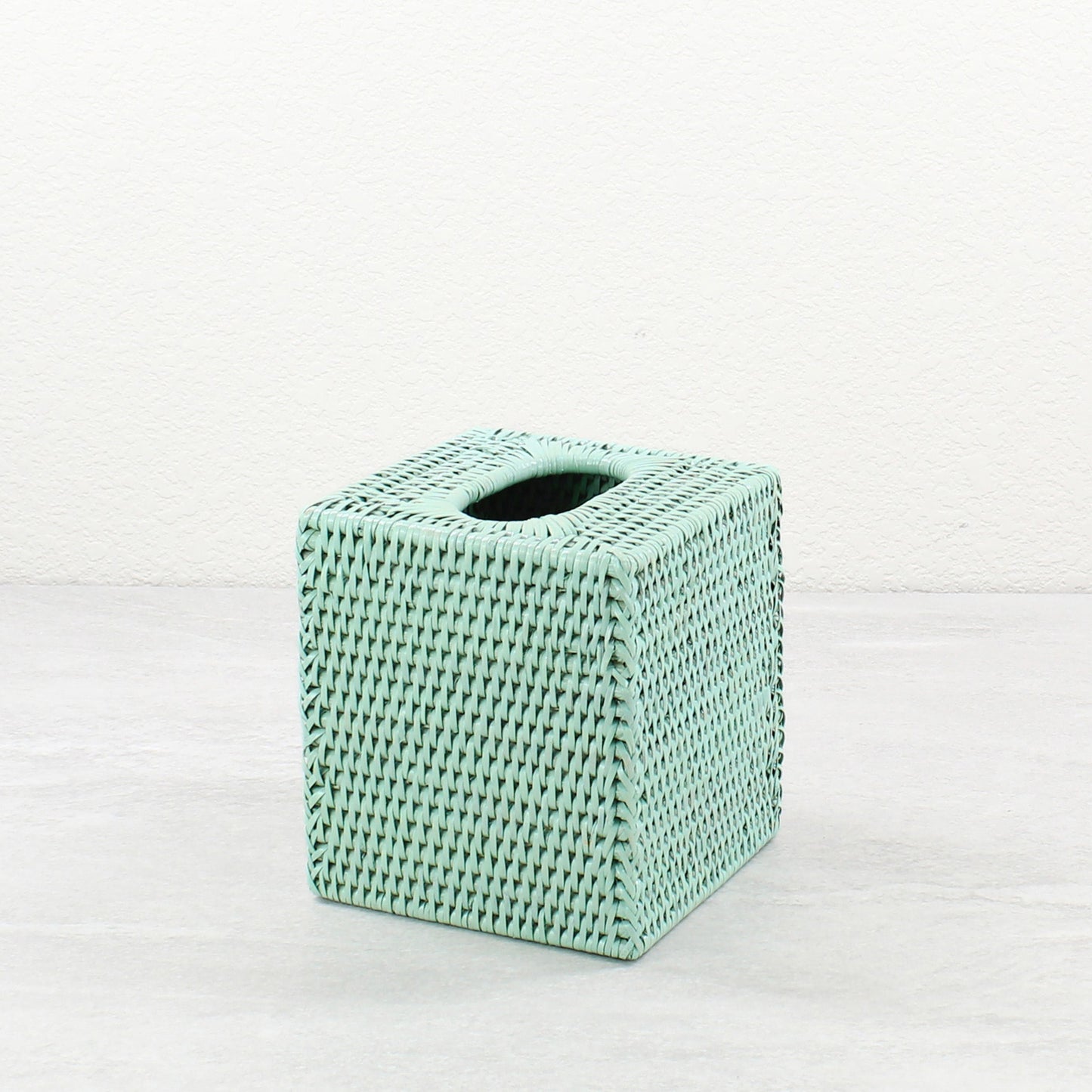 Sage Leaf Green square rattan tissue box cover displayed on a light grey background