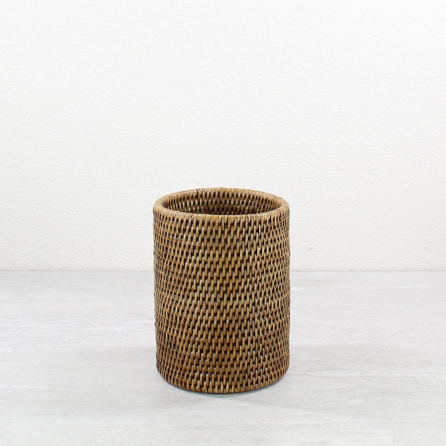 Eco Handcraft honey brown handwoven rattan canister for wine storage or kitchen countertop decor