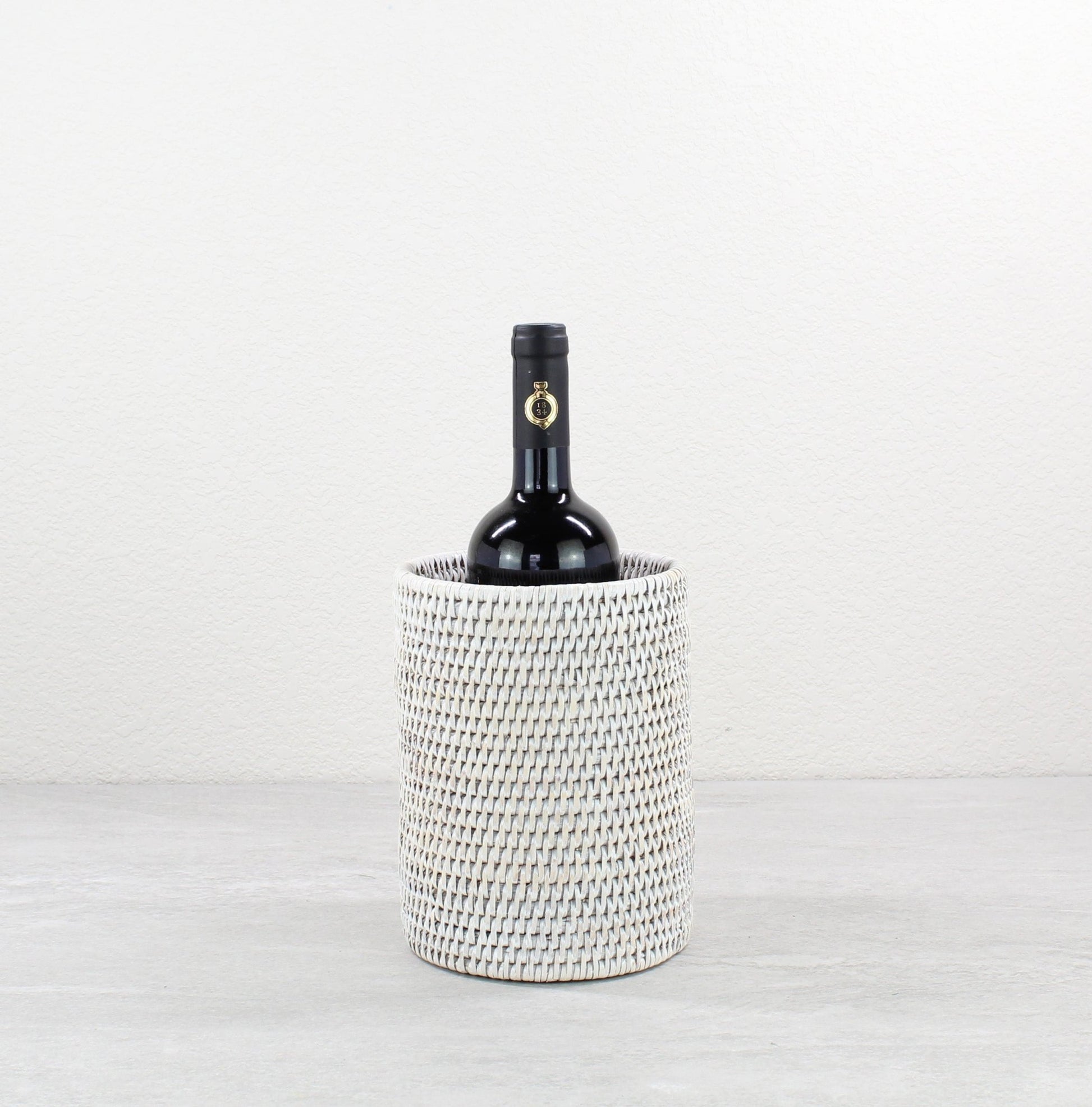 Eco Handcraft whitewash rattan wine holder – handmade cylinder wine cooler for beach-style, rustic, or picnic use