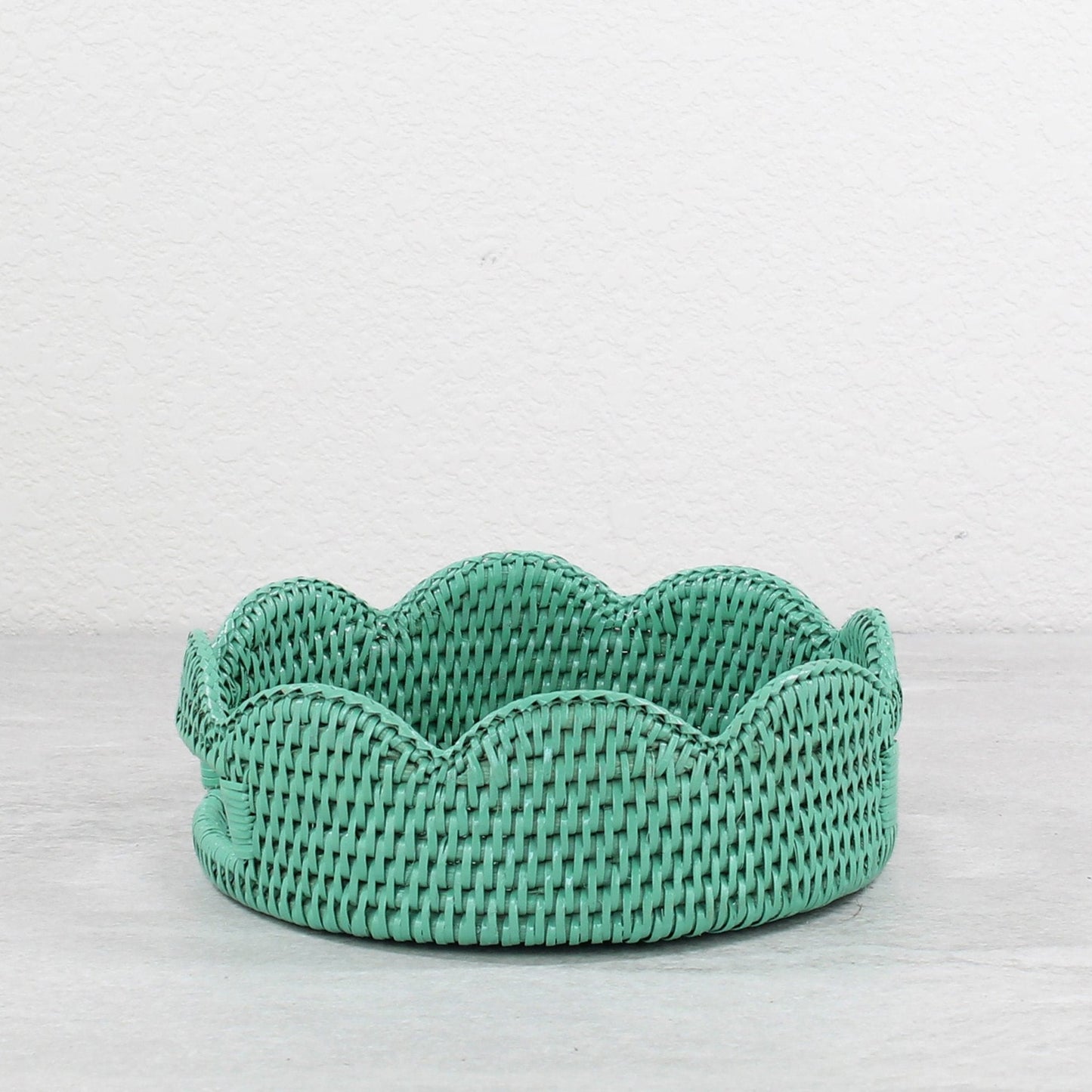 Empty turquoise rattan scalloped tray by ECO HANDCRAFT, handmade for fruit, bread, or decorative storage.
