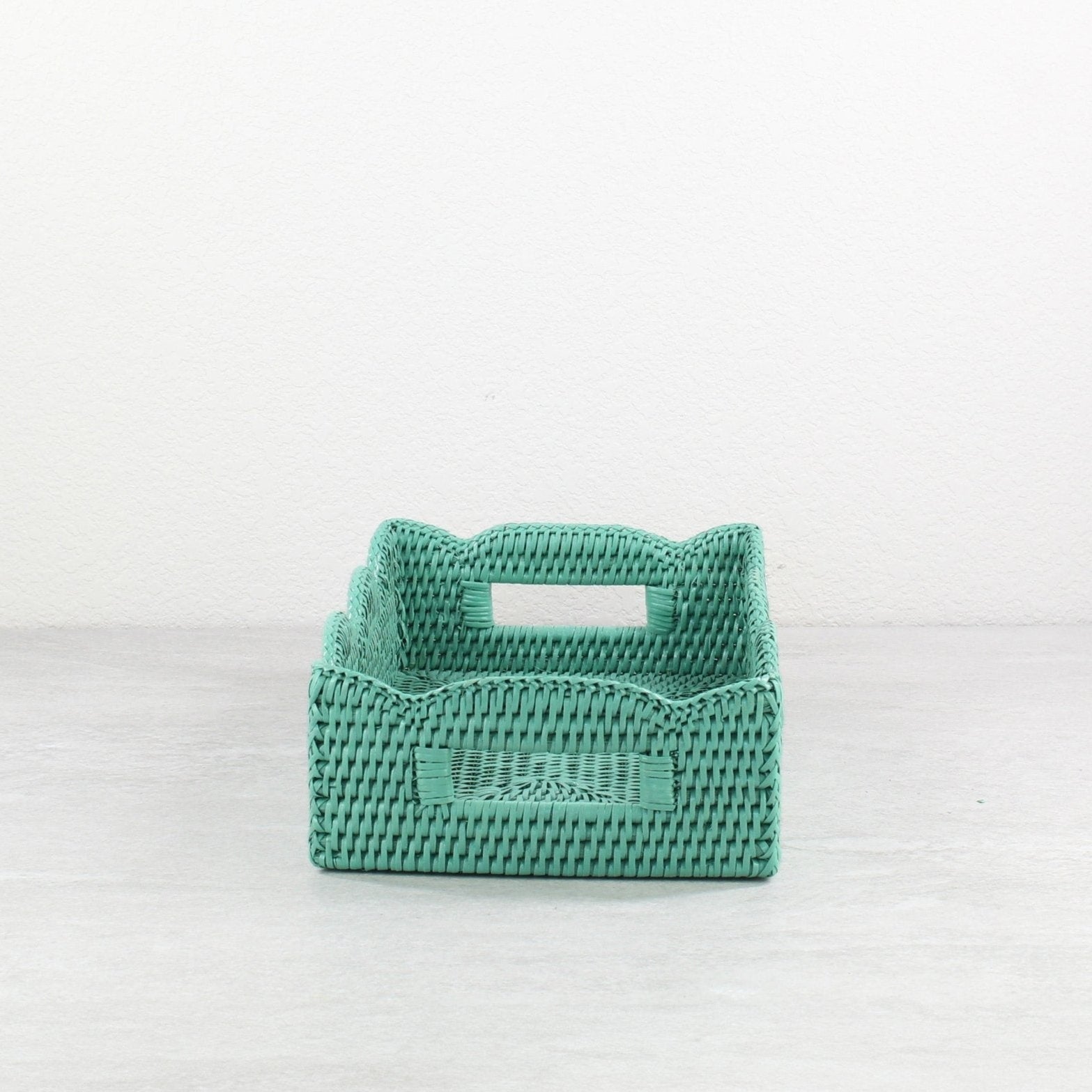 Small turquoise scalloped rectangle rattan tray with built-in side handles, handmade from durable natural rattan for easy carrying and serving.