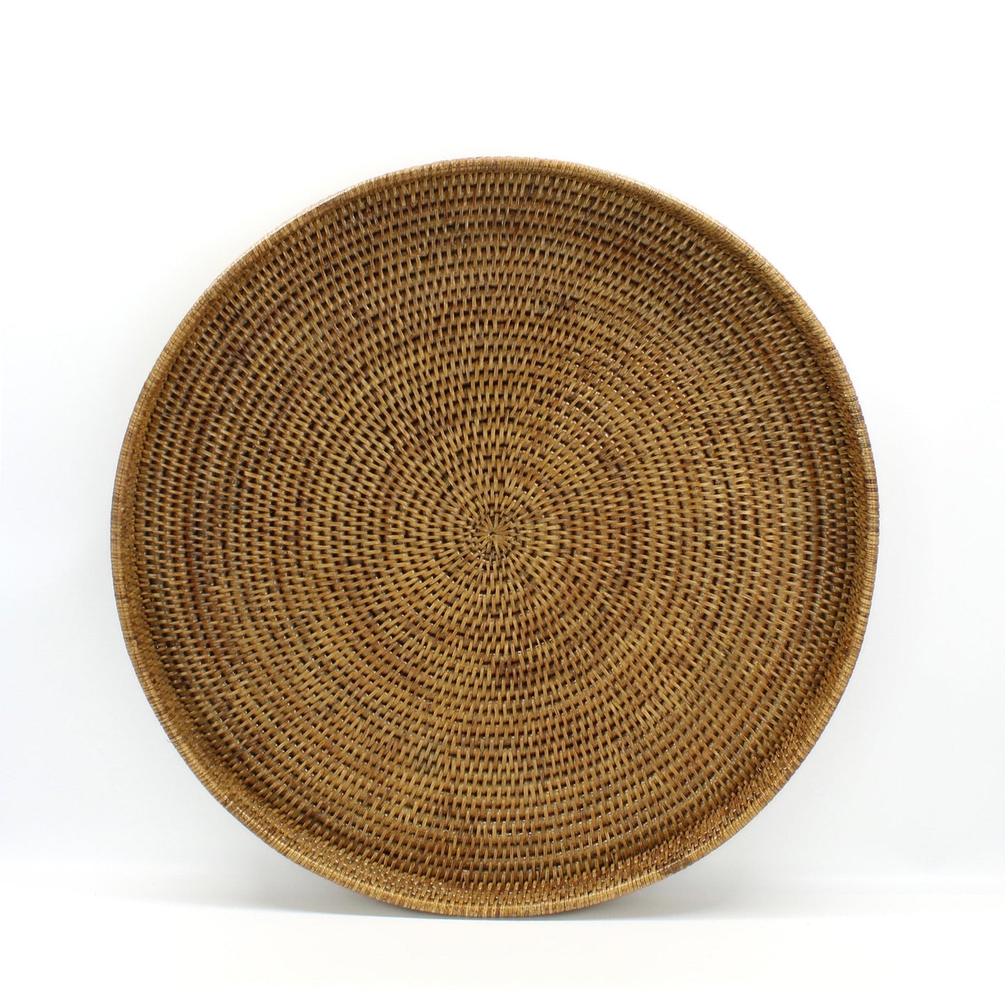 Eco Handcraft large round rattan tray with tight weave and raised edge, shown against a clean white background for styling clarity.