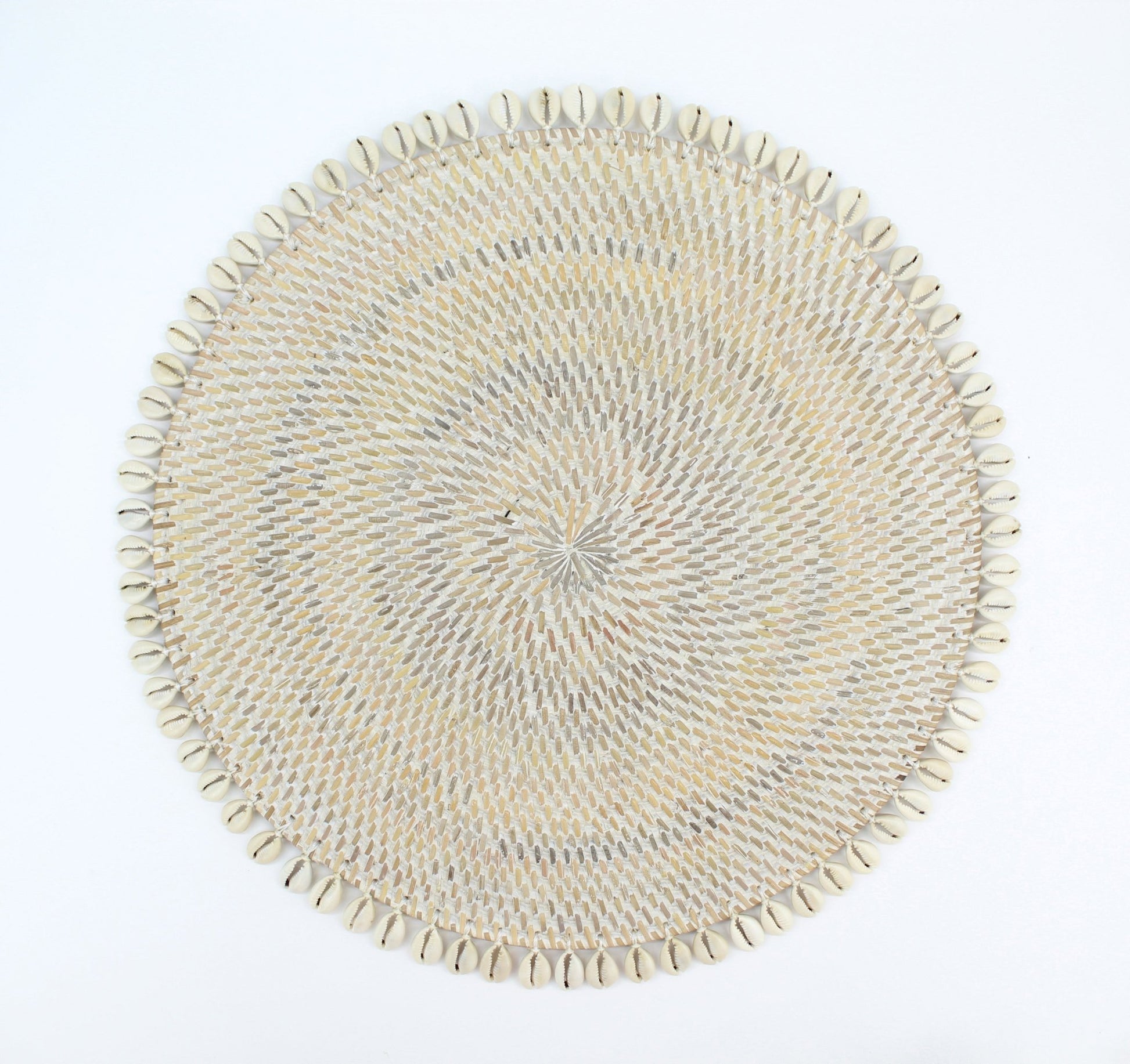 Eco Handcraft handmade rattan placemat with cowrie shell trim – eco-luxury coastal dining for boho and beach interiors