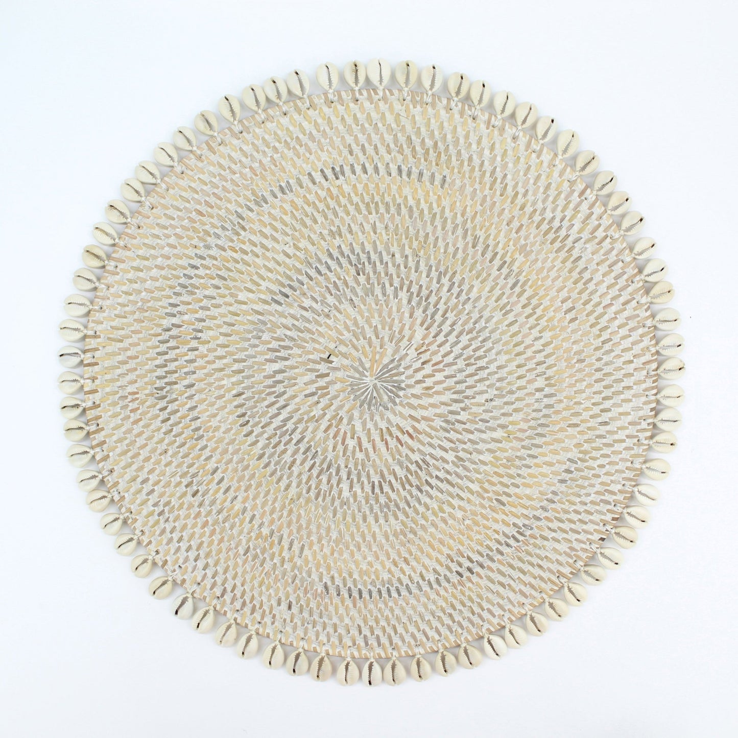 Handmade whitewash rattan placemat with natural seashell trim, shown on white background for clean, product-only display