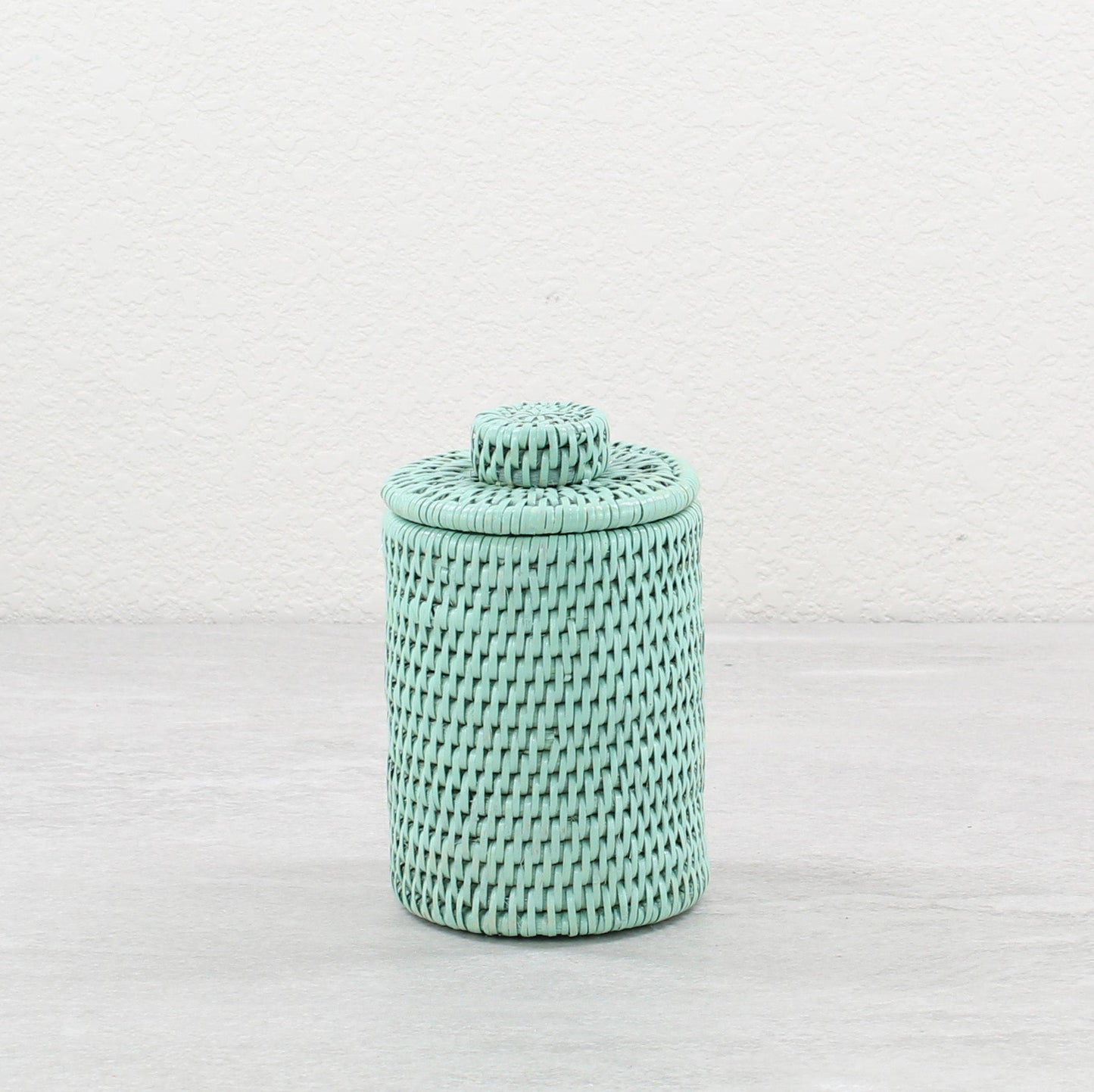 3-Rattan_Round_Basket_with_Lid_No_Insert_-Sustainable_Home_Organizing-Sage_Leaf-01-use_5081b99d-143b-430a-9cbe-1be6f6b426fd
