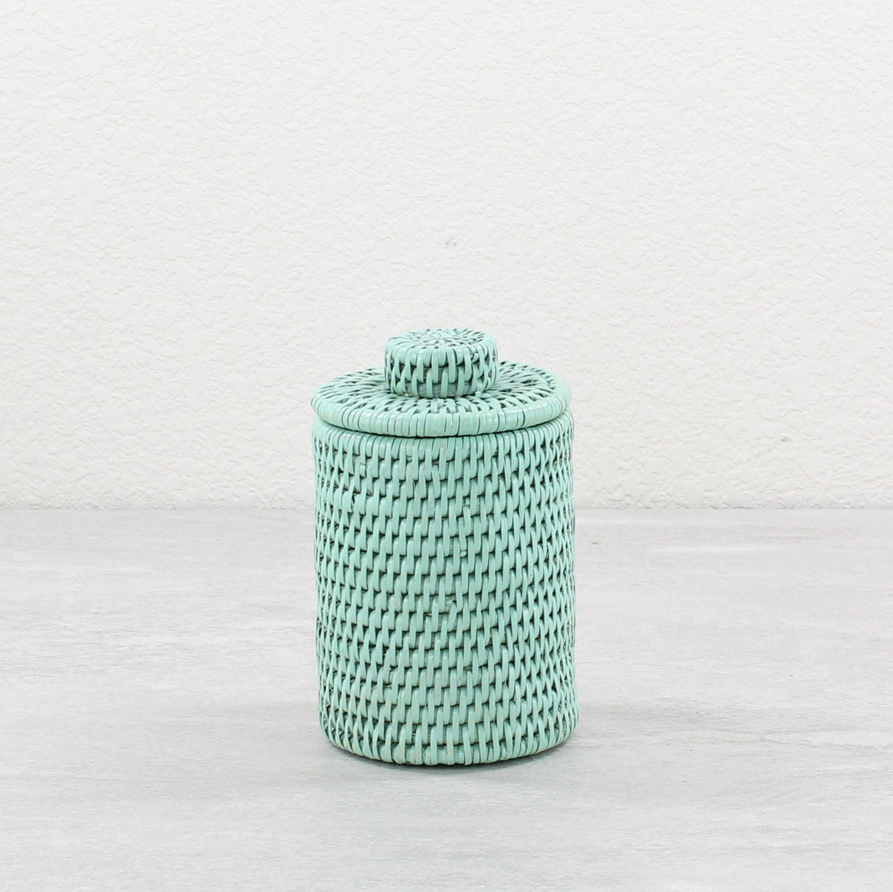 3-Rattan_Round_Basket_with_Lid_No_Insert_-Sustainable_Home_Organizing-Sage_Leaf-01-use_5081b99d-143b-430a-9cbe-1be6f6b426fd