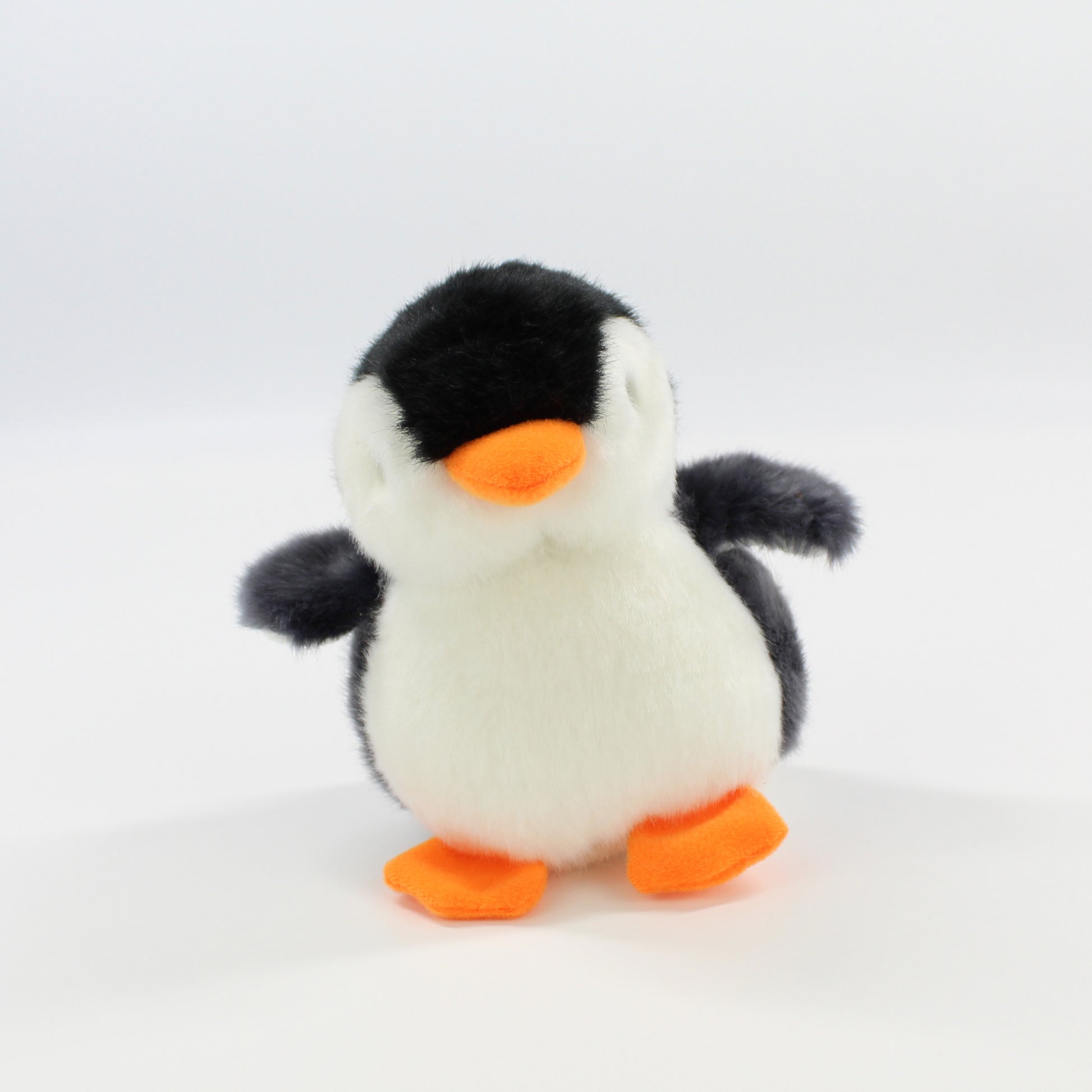 Adorable_Penguin_Plush_in_Cozy_Igloo_-_Perfect_Decor_Gift_Idea-black-09-use