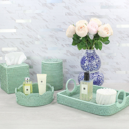 Eco Handcraft sage green rattan vanity set with round and oval trays – handmade spa decor styled with blue vase and roses
