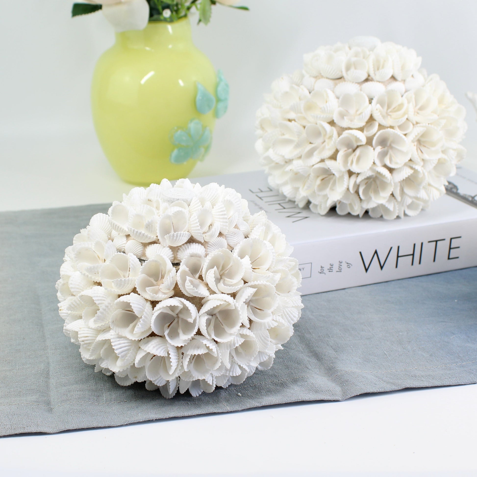 Medium seashell blossom decorative storage box with removable lid, handmade floral shell design for coastal-inspired home accents and trinket storage.