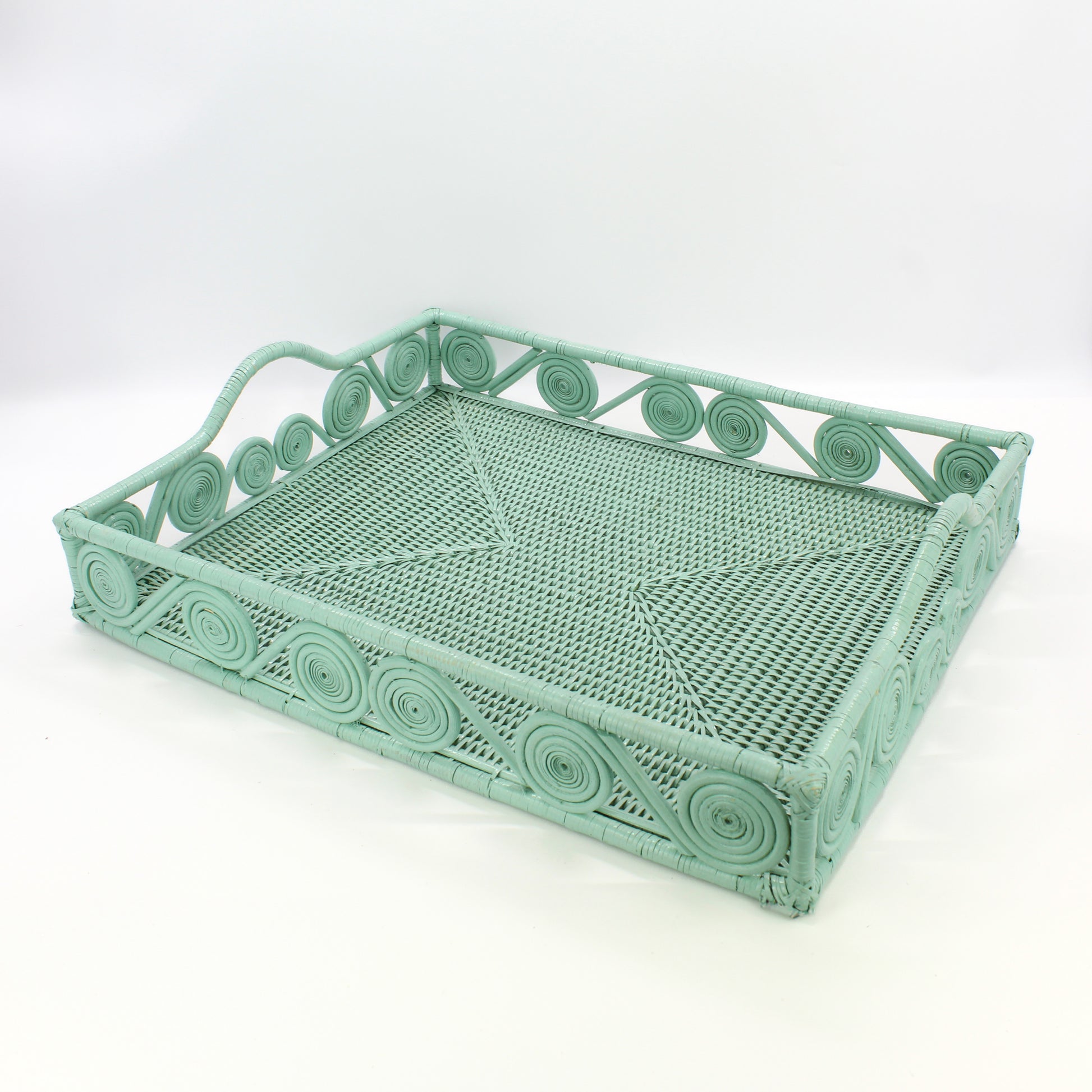 Extra large rectangular rattan tray in sage leaf green with swirly woven edges and handles, handwoven eco-friendly home décor organizer