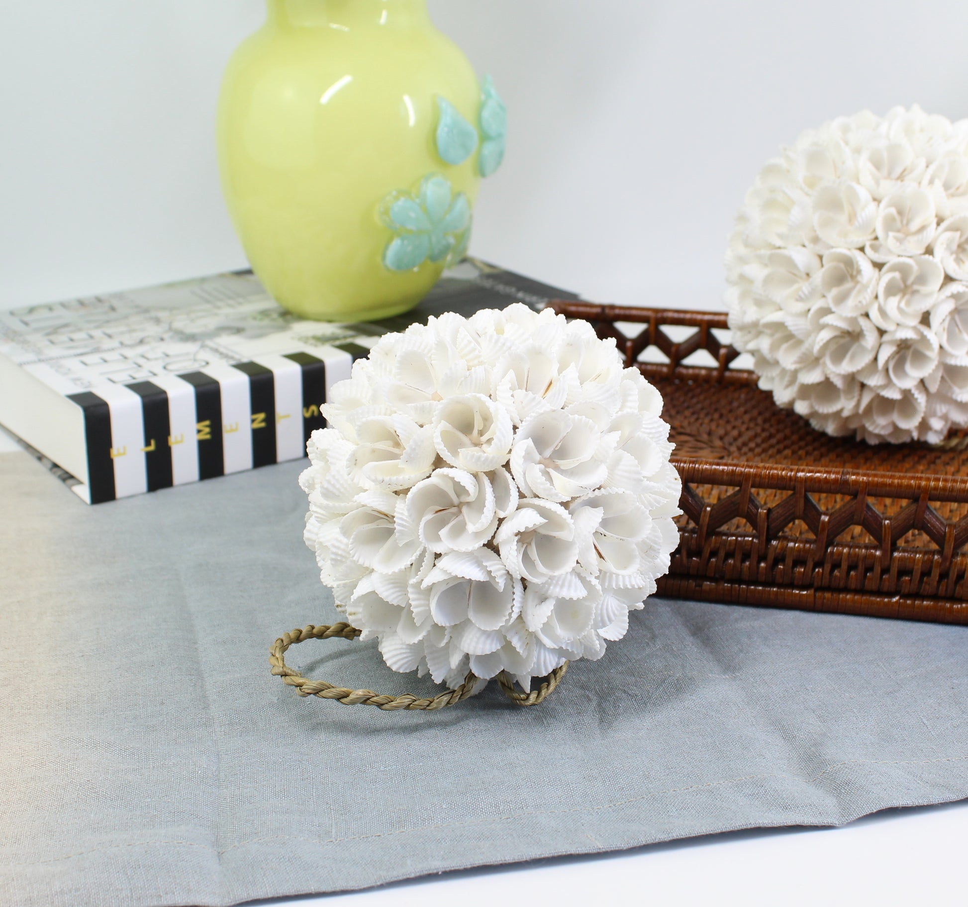 Medium handmade seashell blossom ball with detailed shell flower design, perfect for modern coastal home and table decoration.