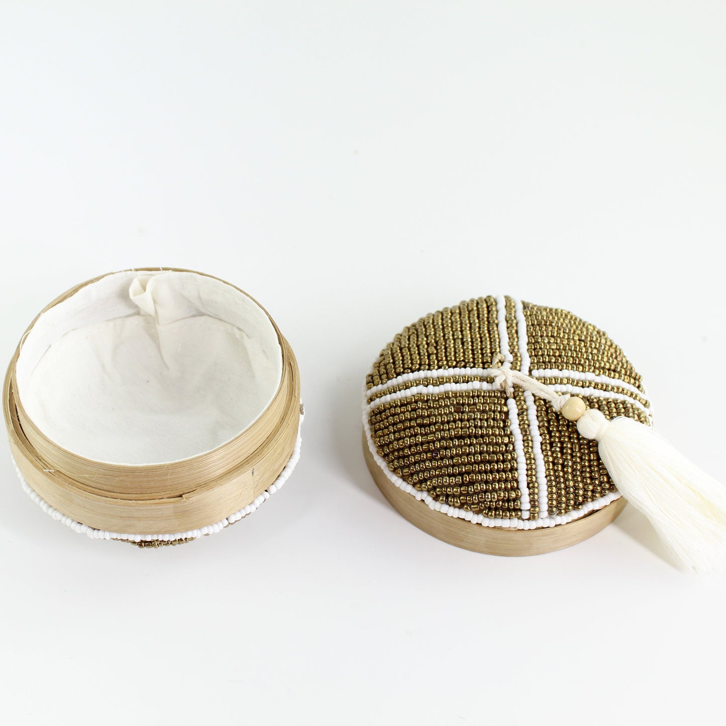 Open beaded bamboo tassel box with fabric-lined interior, ideal for jewelry, trinkets, or decorative storage on dressers and shelves.