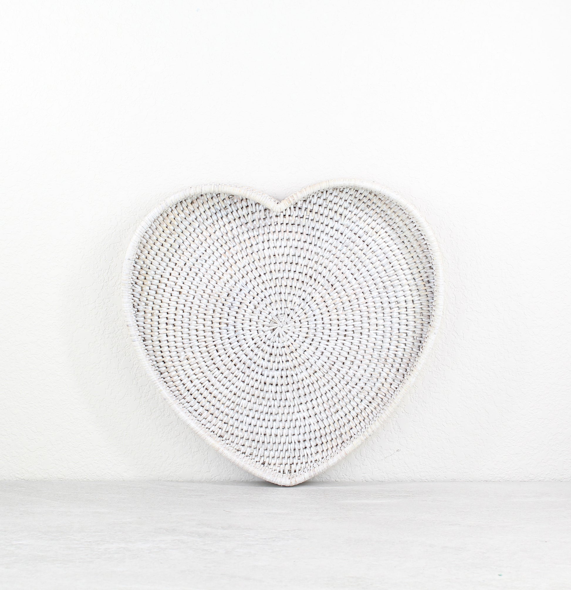 Rattan-Dinning-Accessory-Collection-2_Cases_Round_Condiment_Holder-Sustainable_Home_Organizing-Whitewash-Rattan_Salt_and_Pepper_Tray-Round_Scalloped_Rattan_Tray-Close_Weave-Heart_Tray-15