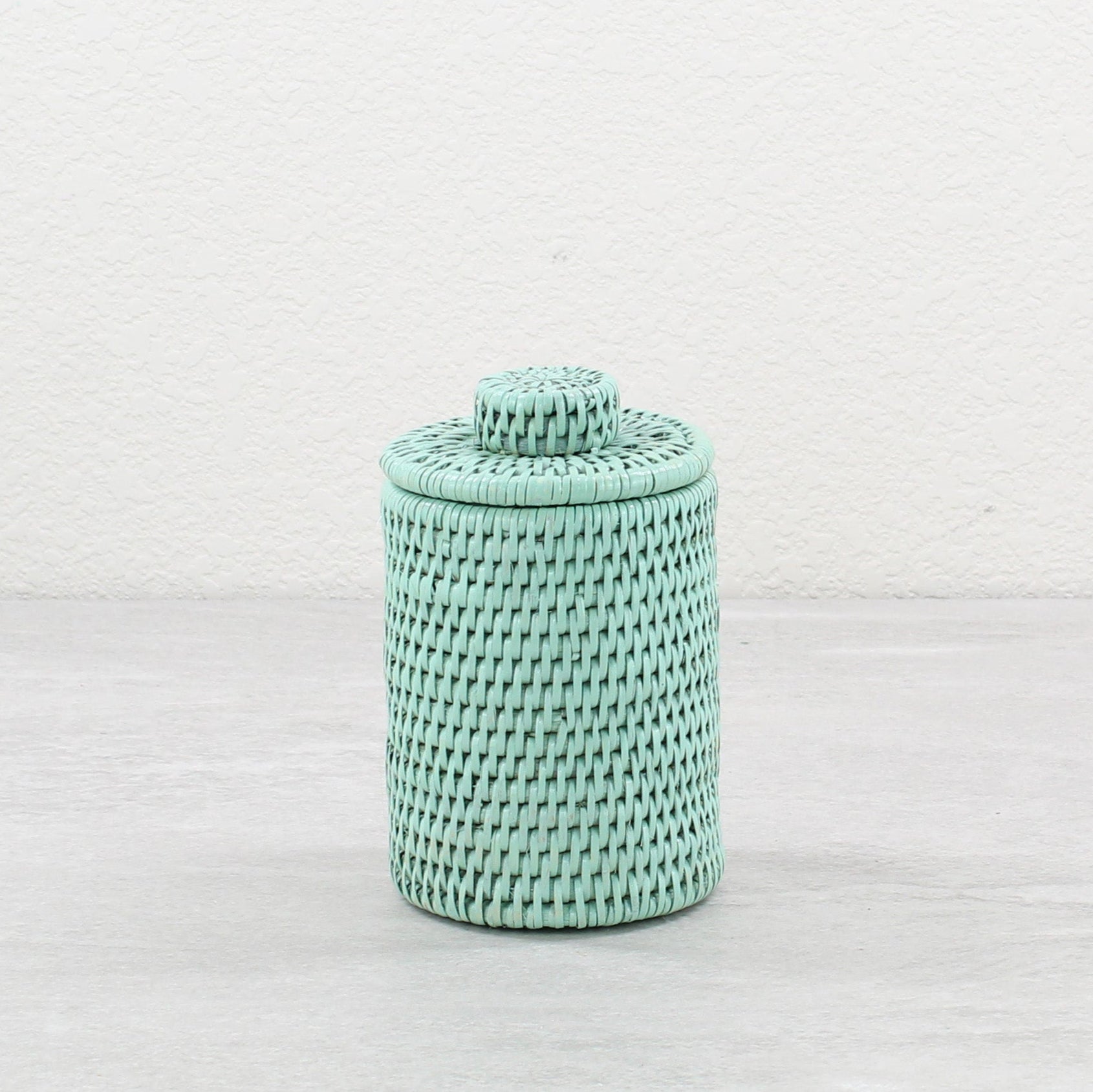 Eco Handcraft small sage green rattan canister with lid – handmade, sustainable storage for spa, vanity, or bath