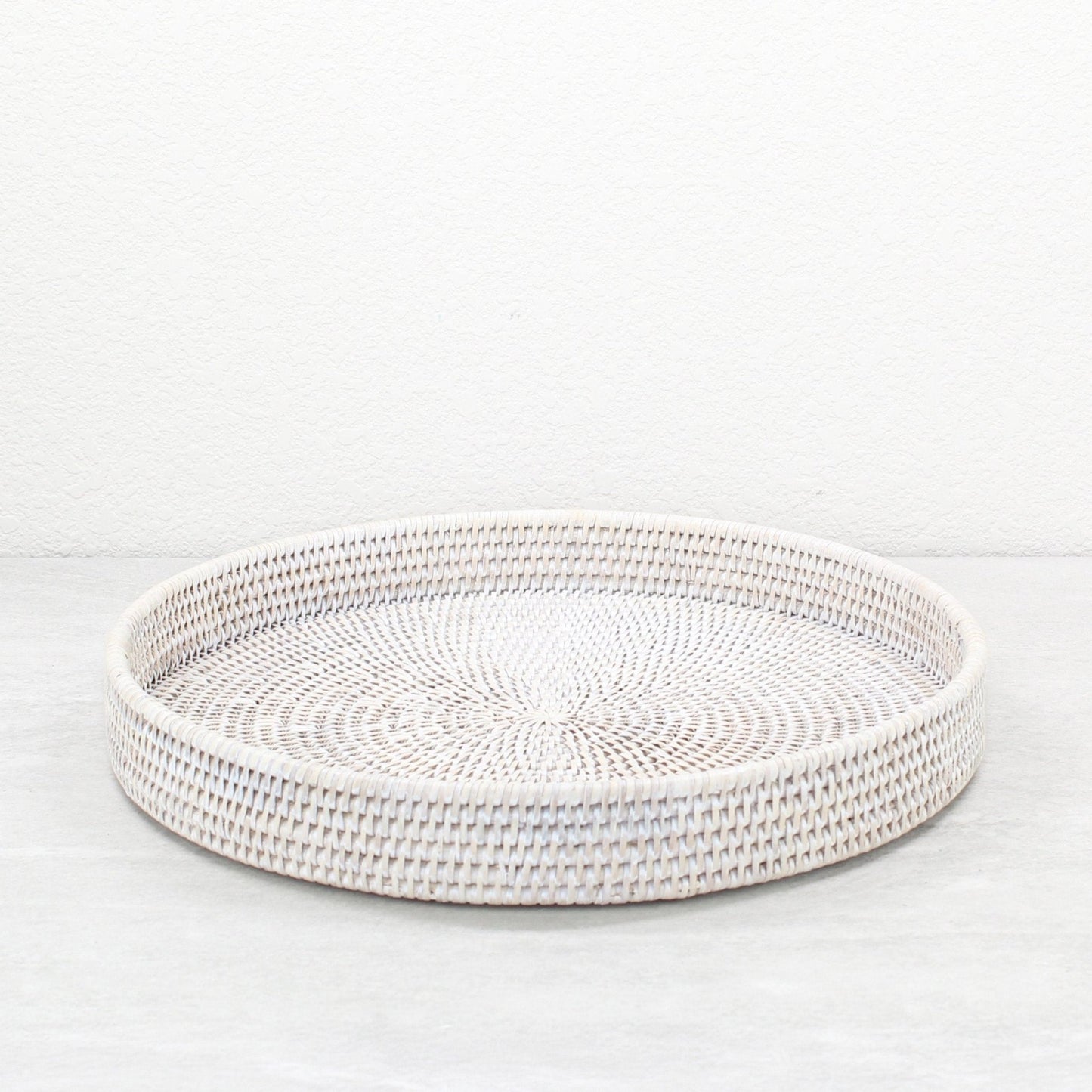 Tight woven round rattan tray in whitewash finish, 12-inch eco-friendly handmade storage or serving tray.