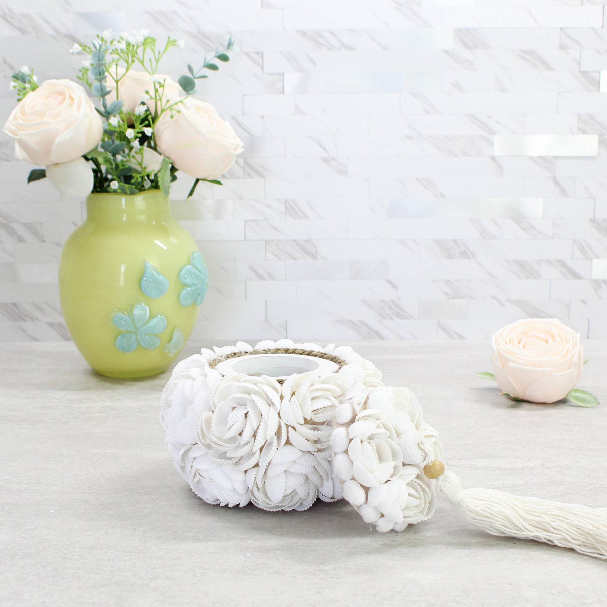Medium seashell rose jewelry and keepsake box with open lid and tassel, handmade from white seashells for sustainable coastal home décor.